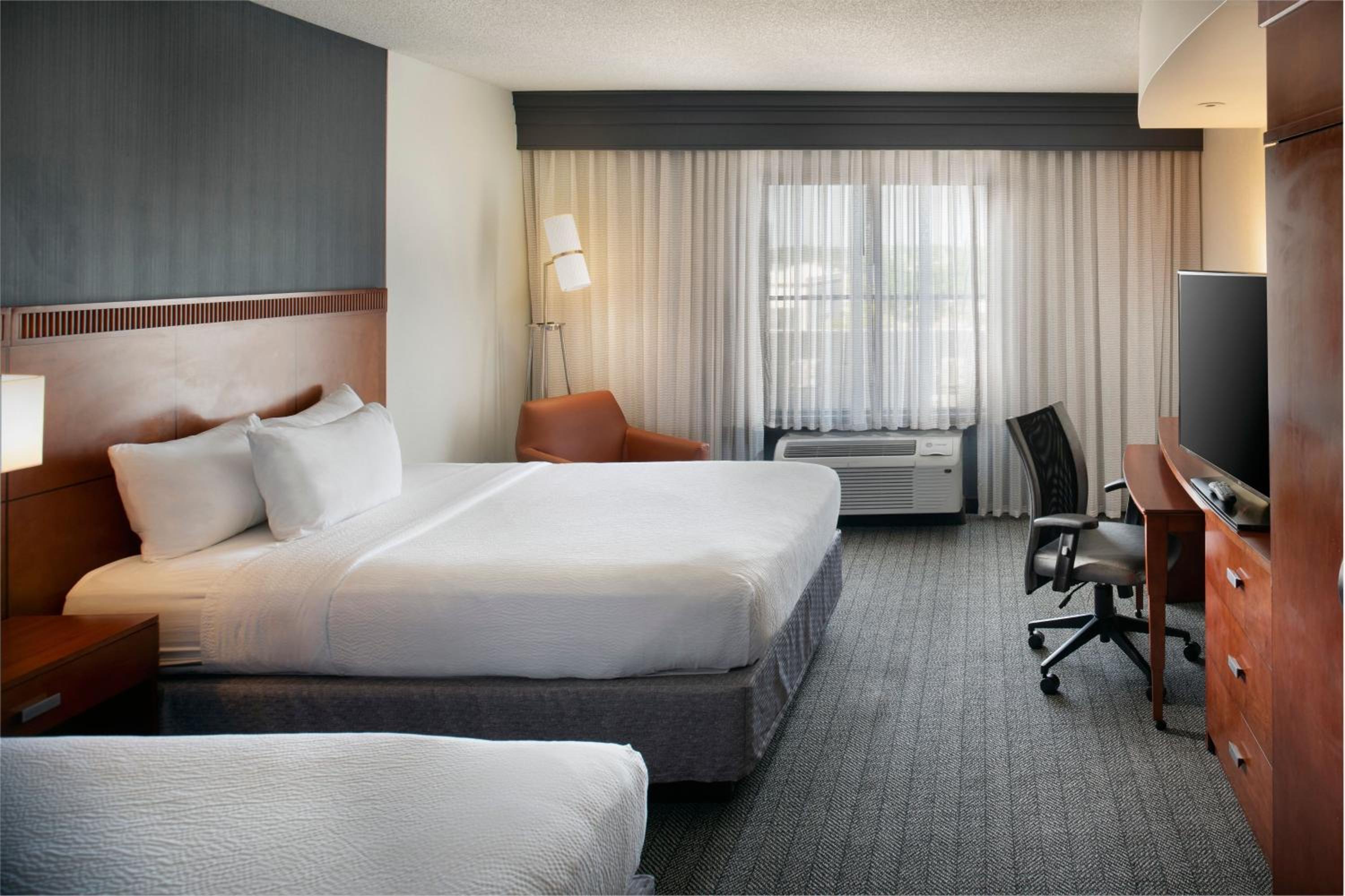 Queen Room with Two Queen Beds - Photo 1