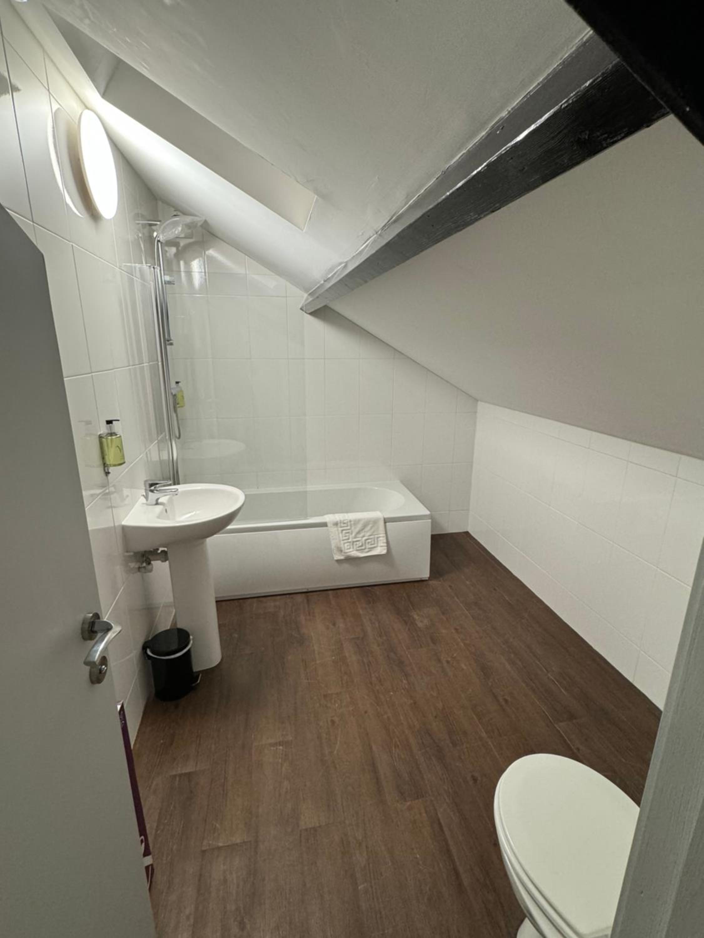 Three-Bedroom Apartment - Photo 4