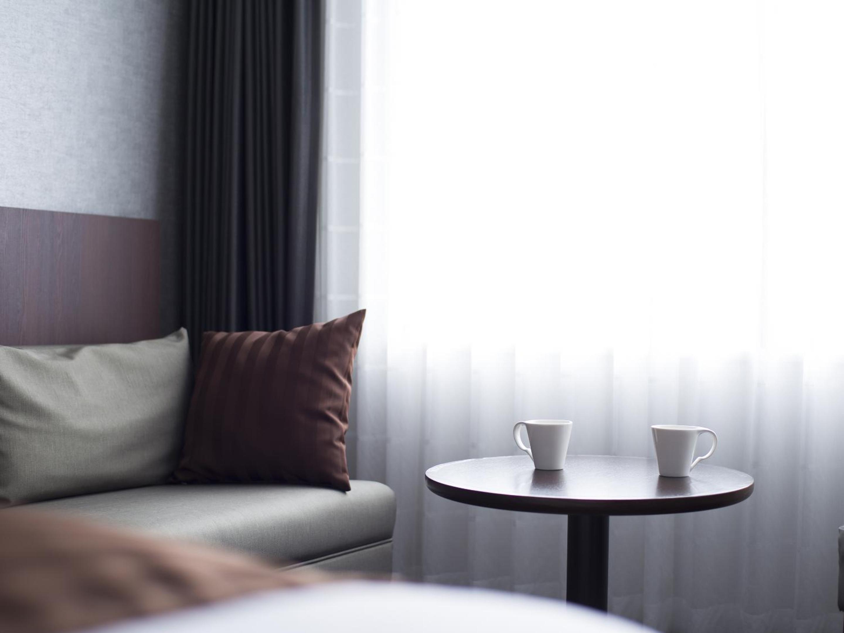 Triple Room with Two Single Beds, One Extra Bed and Sea View photo 3