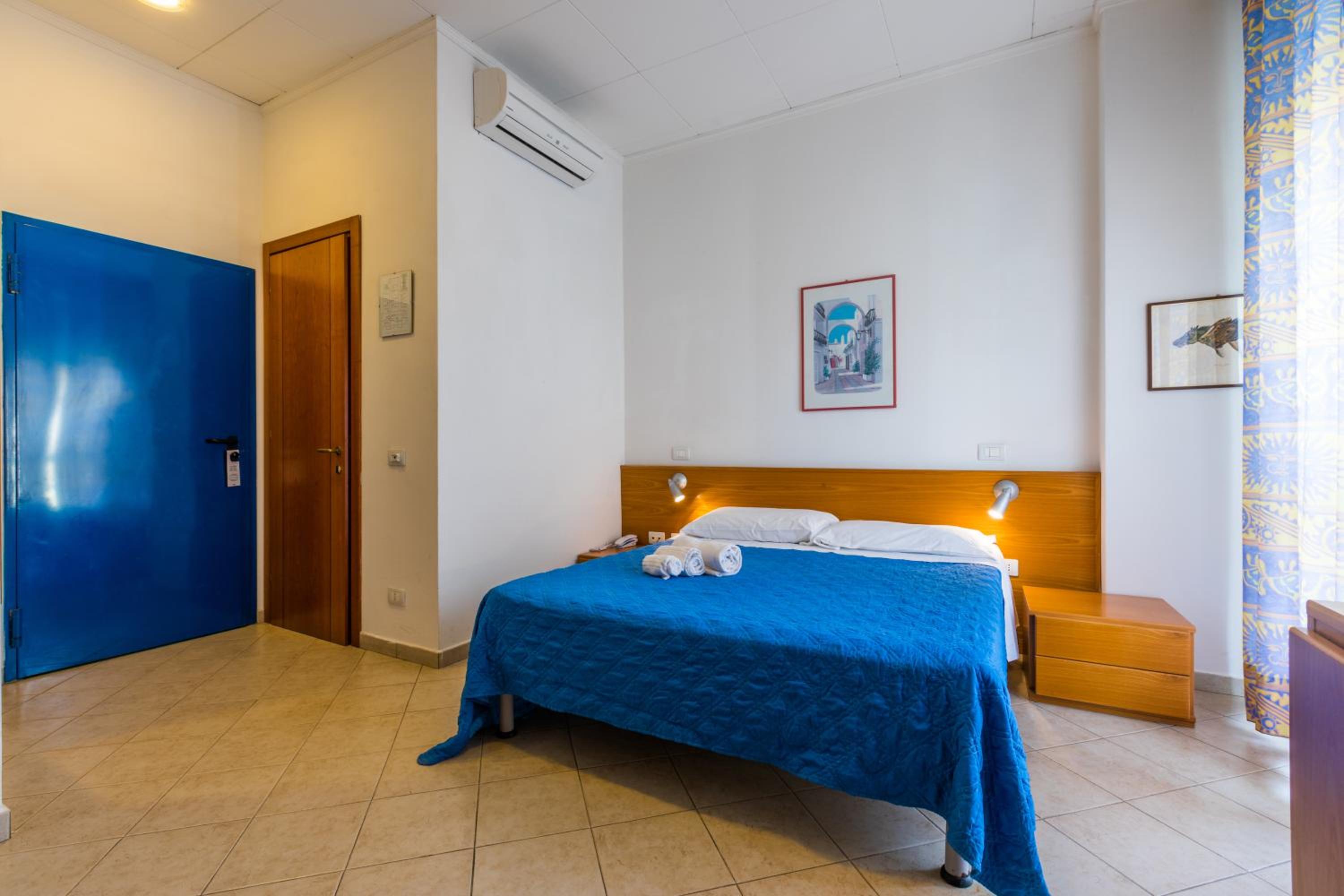 Quadruple Room with Balcony photo 3