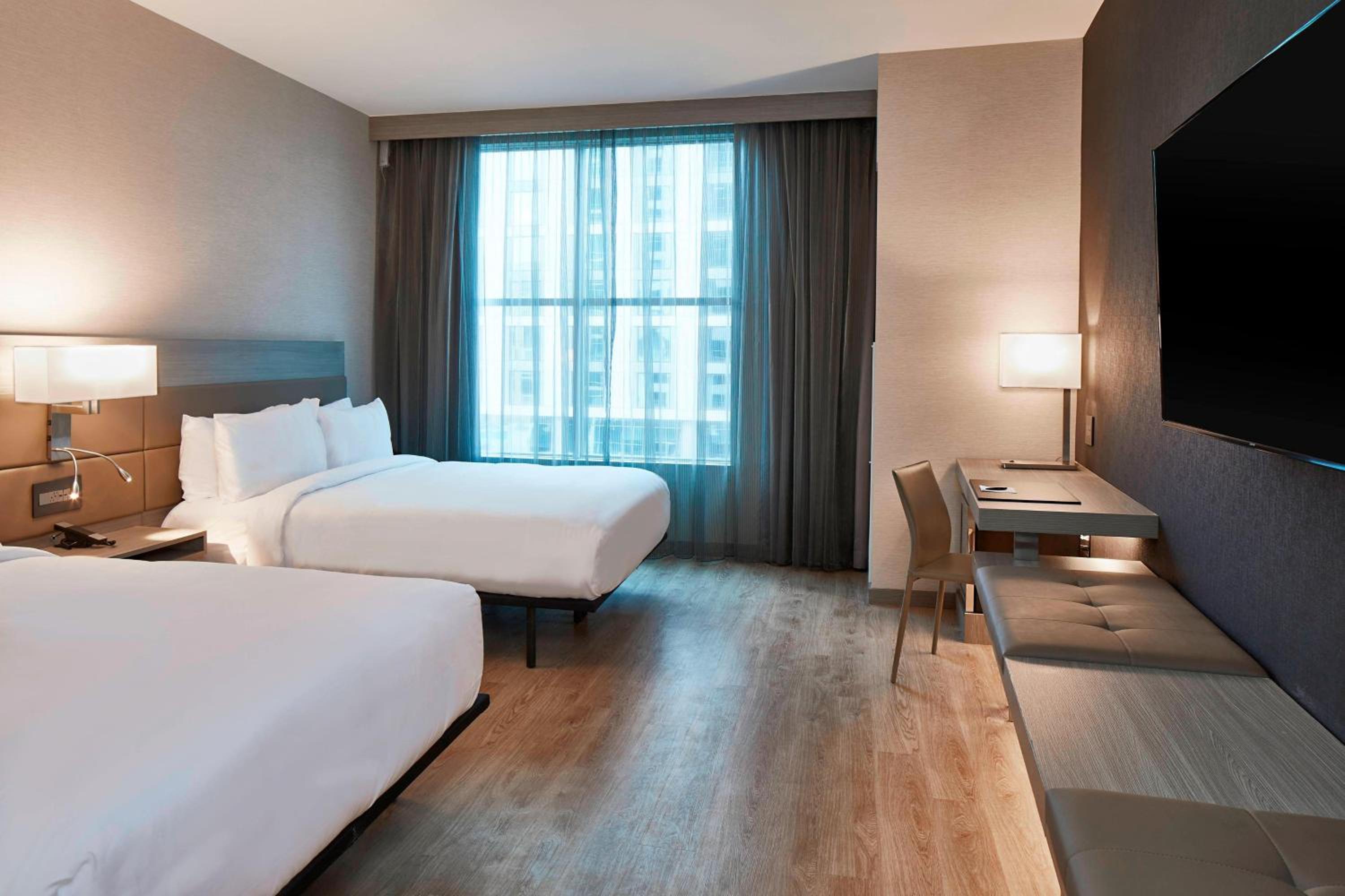 Queen Room with Two Queen Beds - Hearing Accessible photo 2