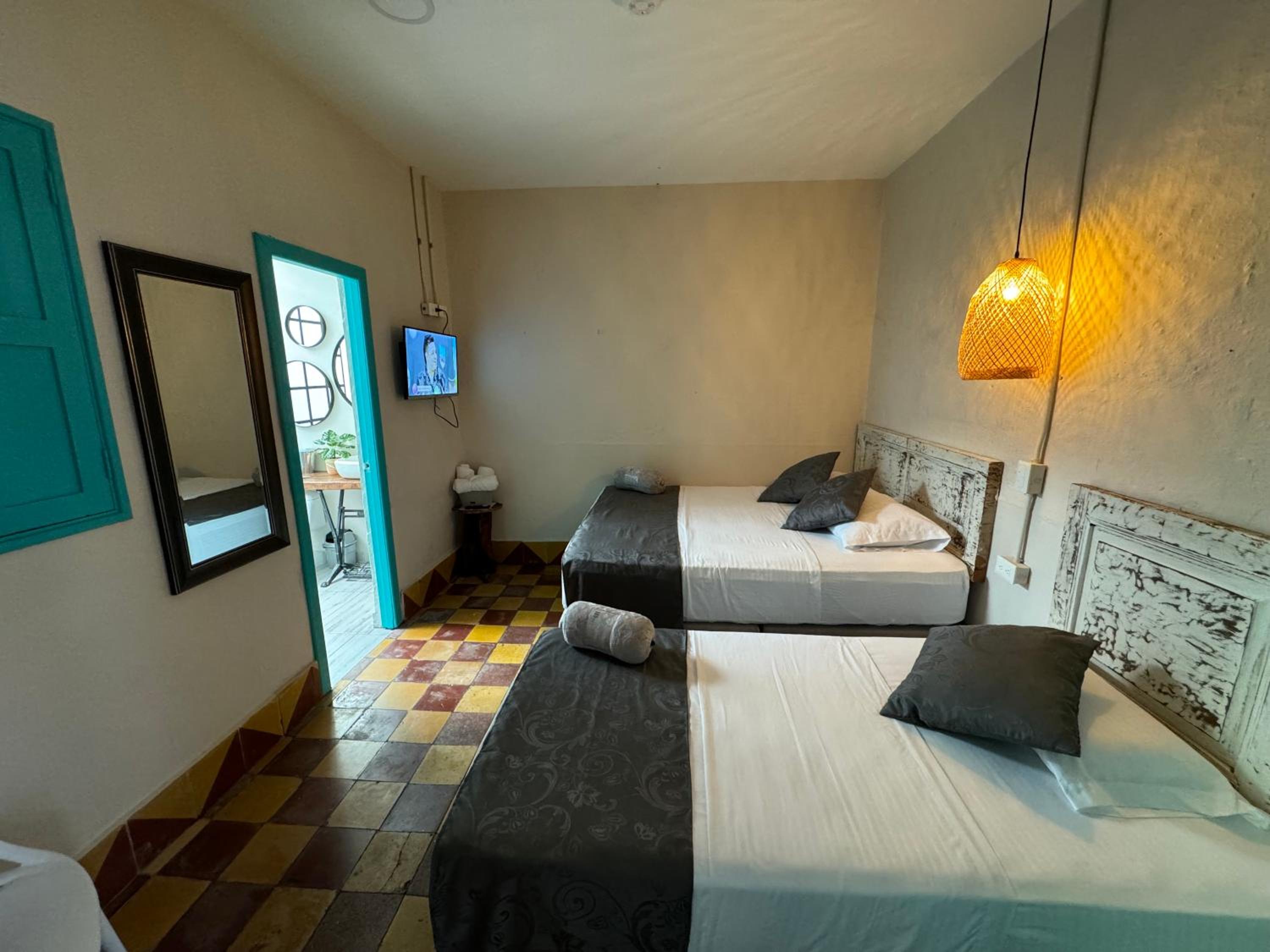 Quadruple Room with Private Bathroom photo 1