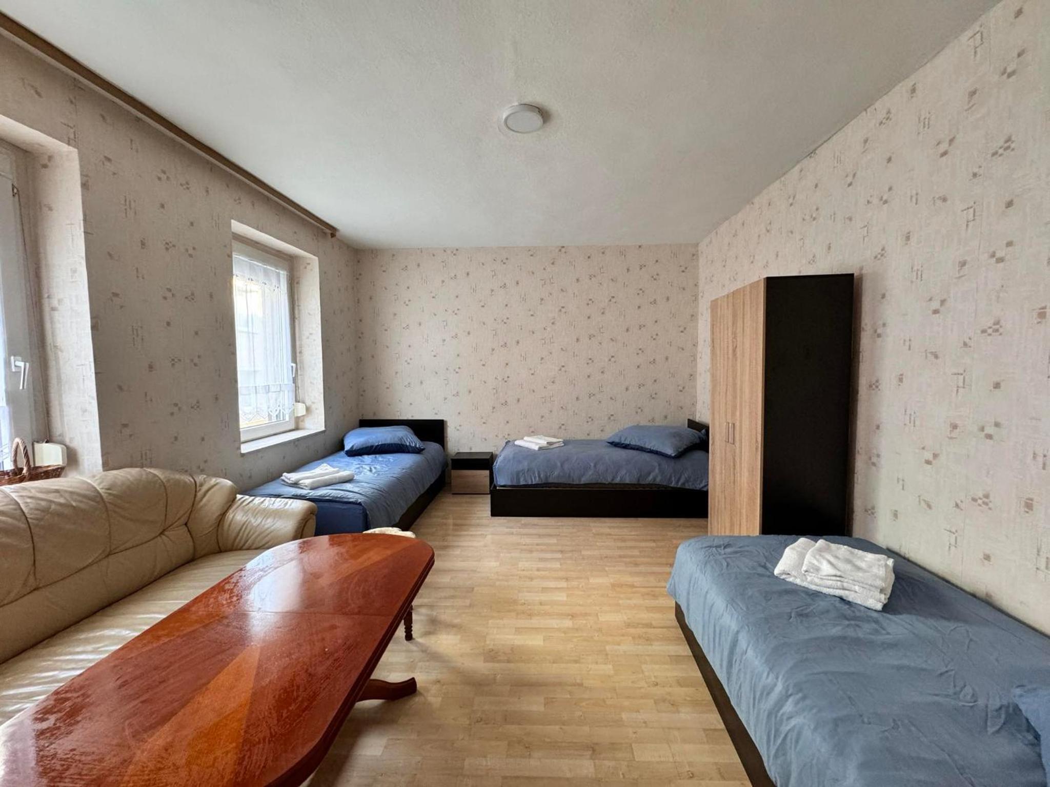 Basic Triple Room with Shared Bathroom photo 2