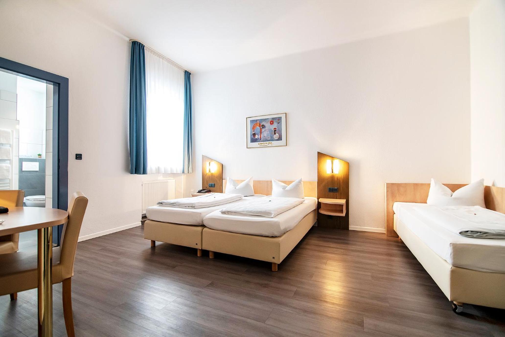 Triple Room - Photo 1