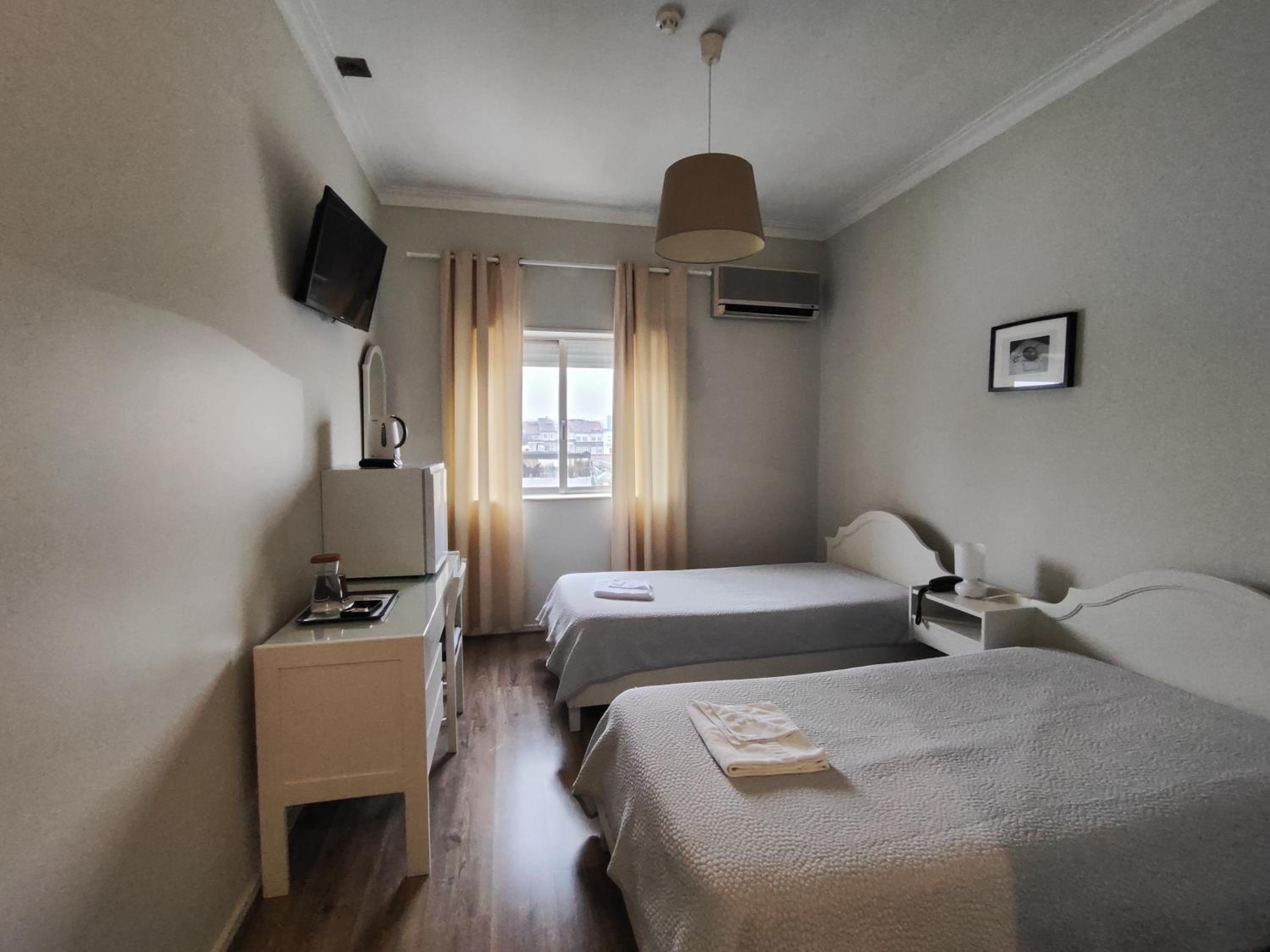 Twin Room - Photo 1