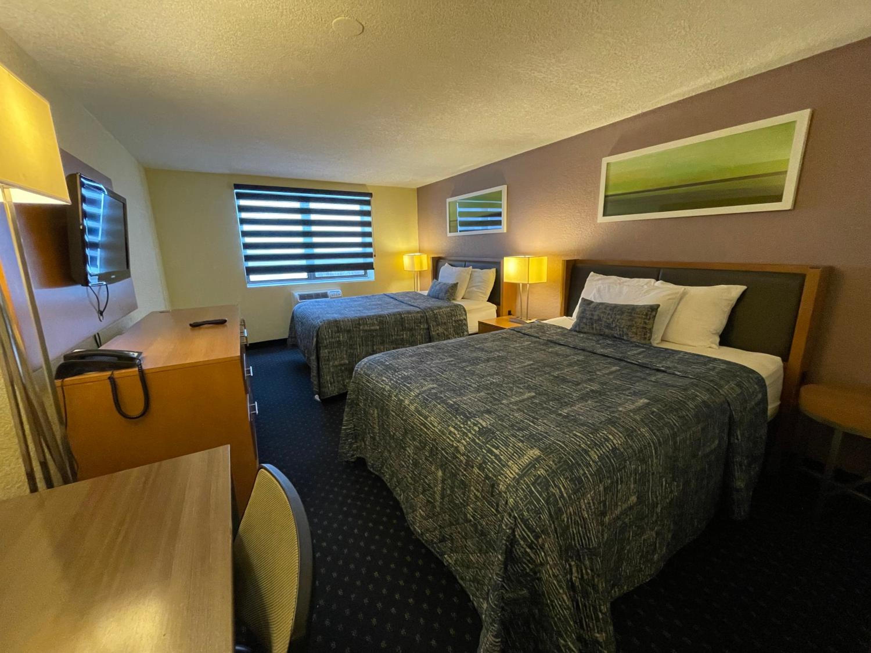 Standard Queen Room with Two Queen Beds - Photo 1
