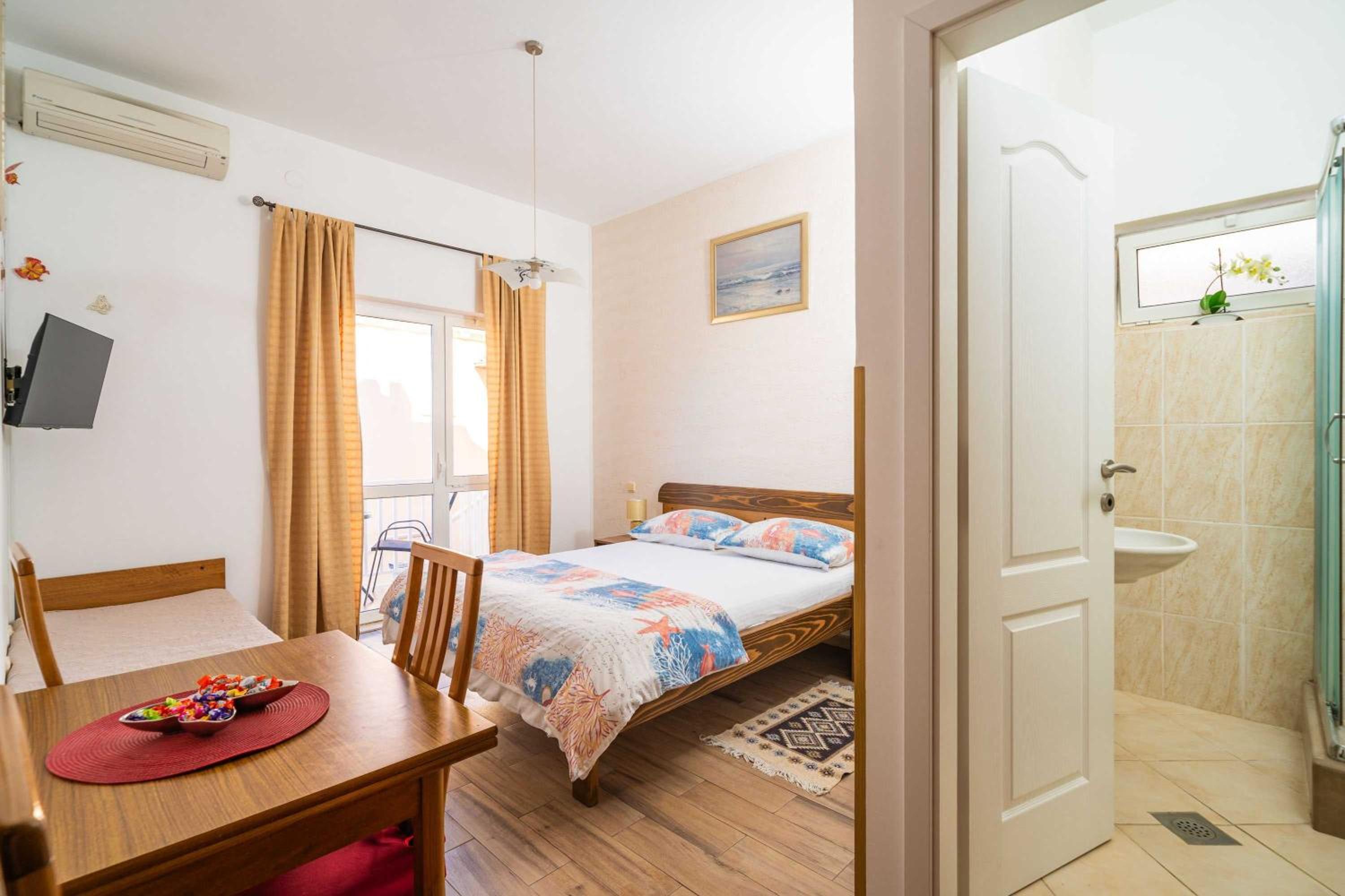 Studio Apartment with Balcony and Side Sea View