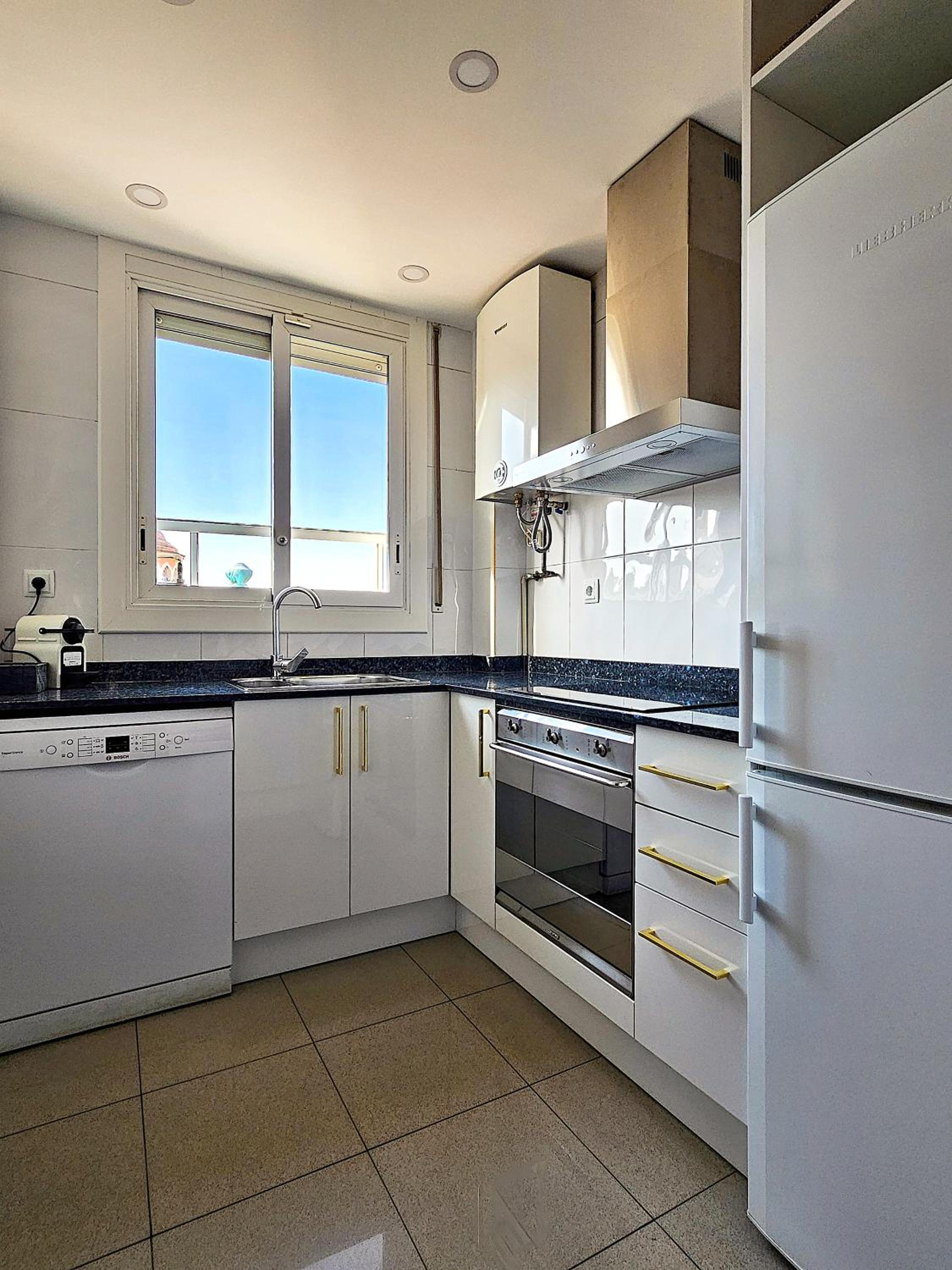 Three-Bedroom Apartment photo 2