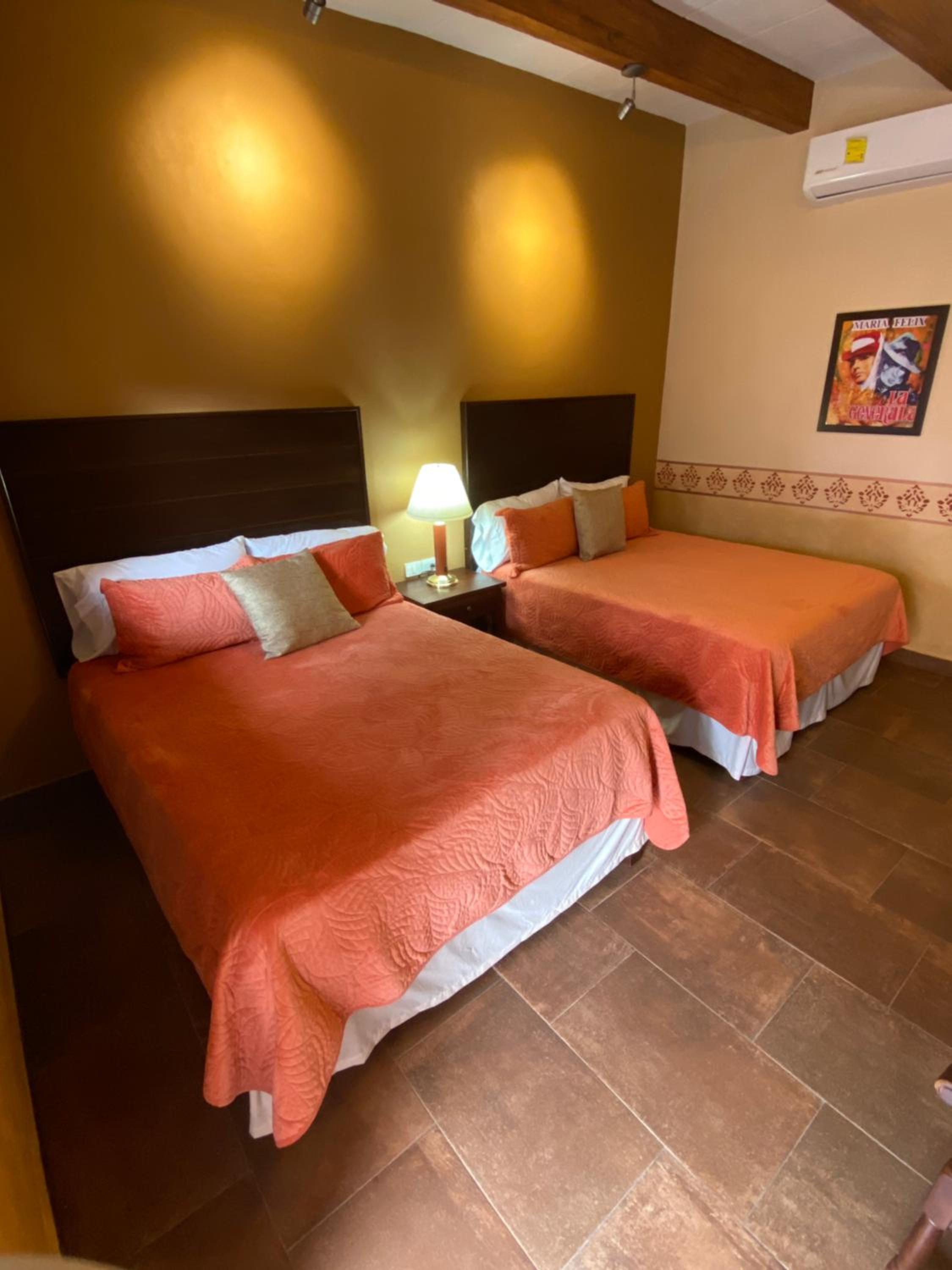 Standard Queen Room with Two Queen Beds - Photo 2
