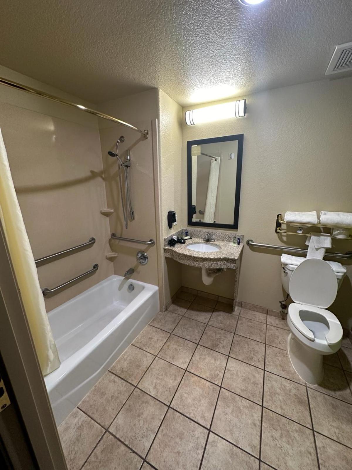 Queen Suite with Two Queen Beds and Sofa Bed - Photo 6