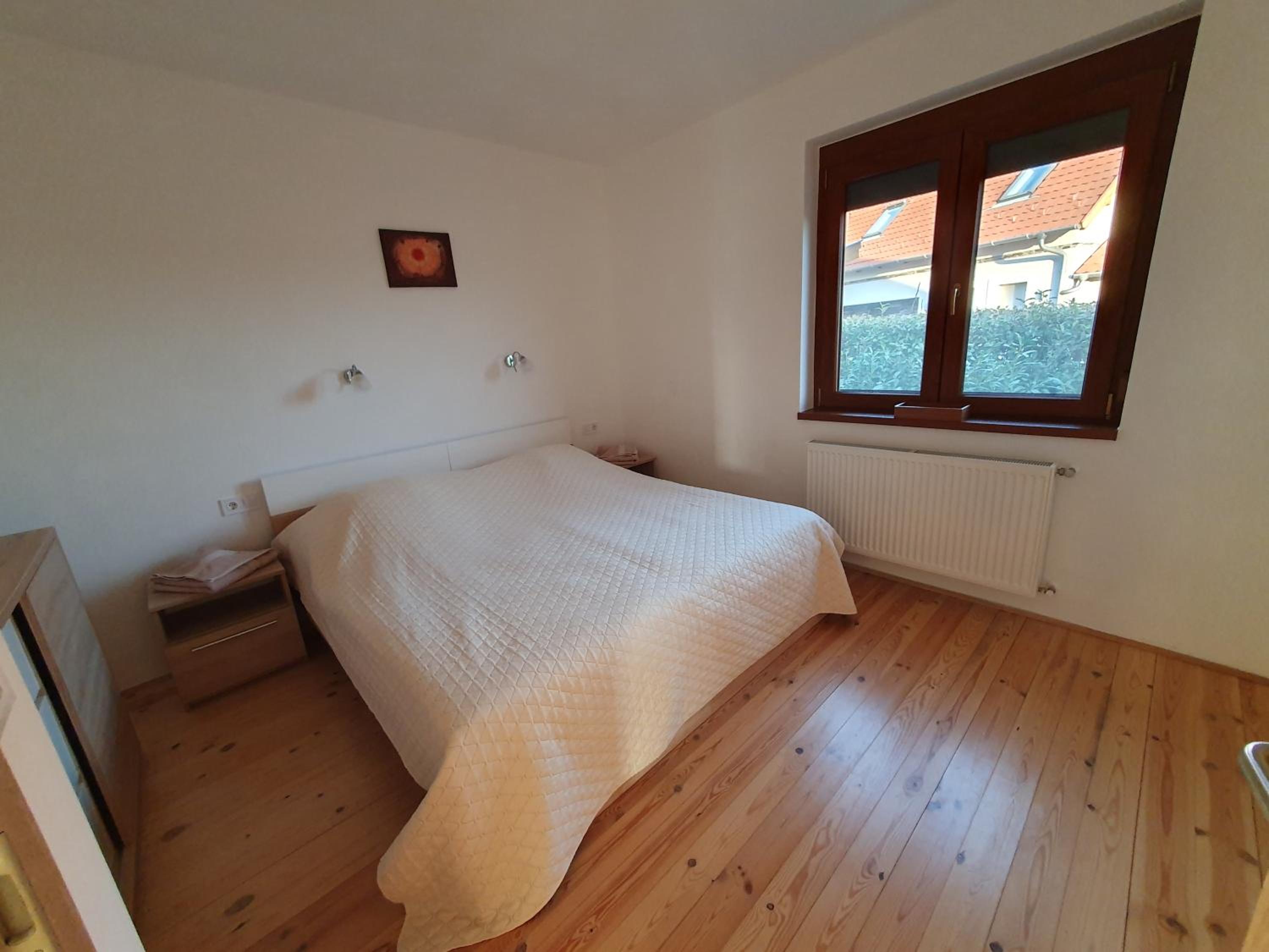 Three-Bedroom House - Photo 27