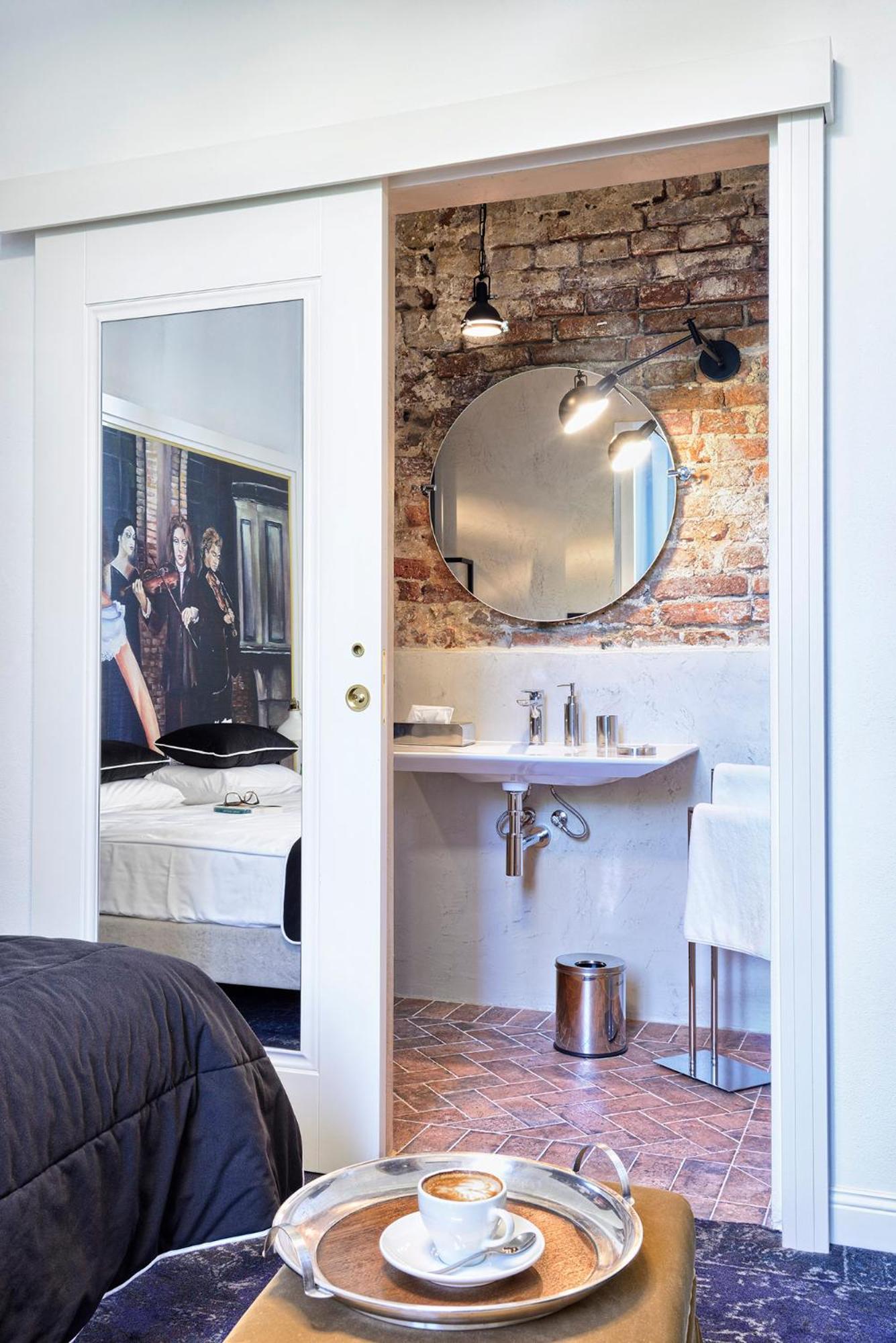 Apartment with historic brick photo 2