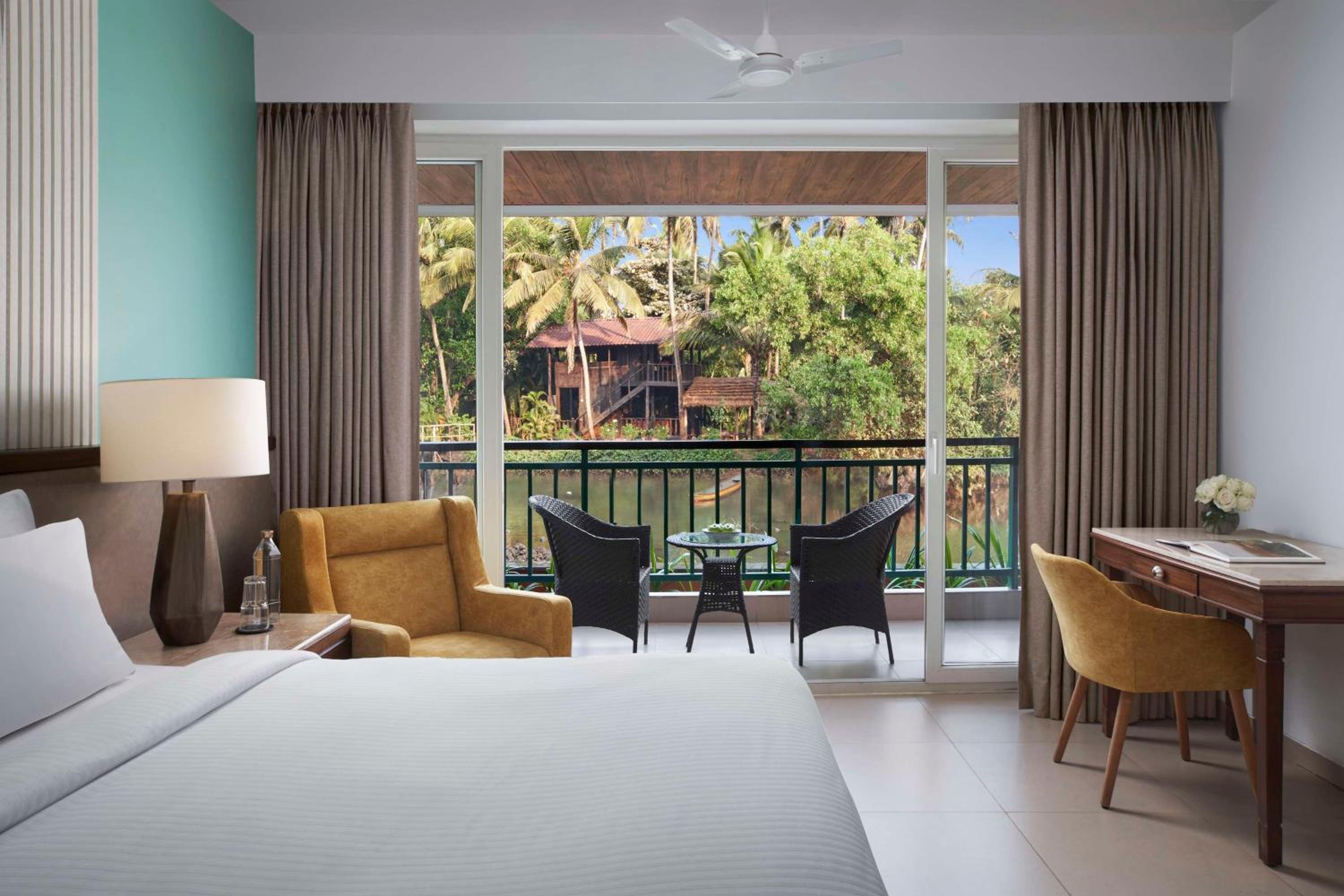 Deluxe Room with River View & Balcony - 1 child below 12 stays for free (upto 30 Sep 2026 check-in) + Beer on arrival + Happy Hours (6-8PM)