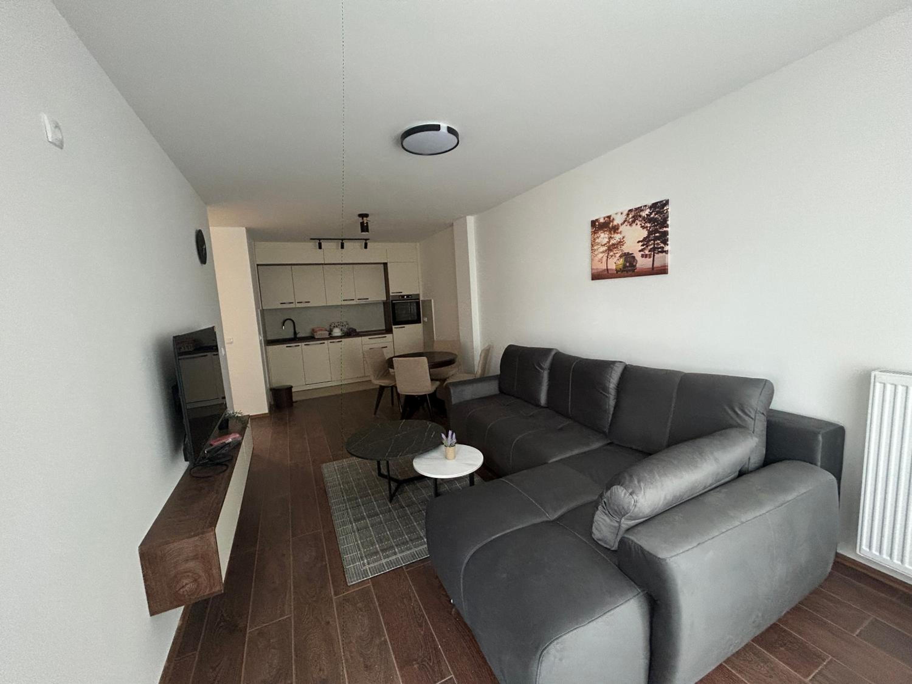 One-Bedroom Apartment with Balcony and City View