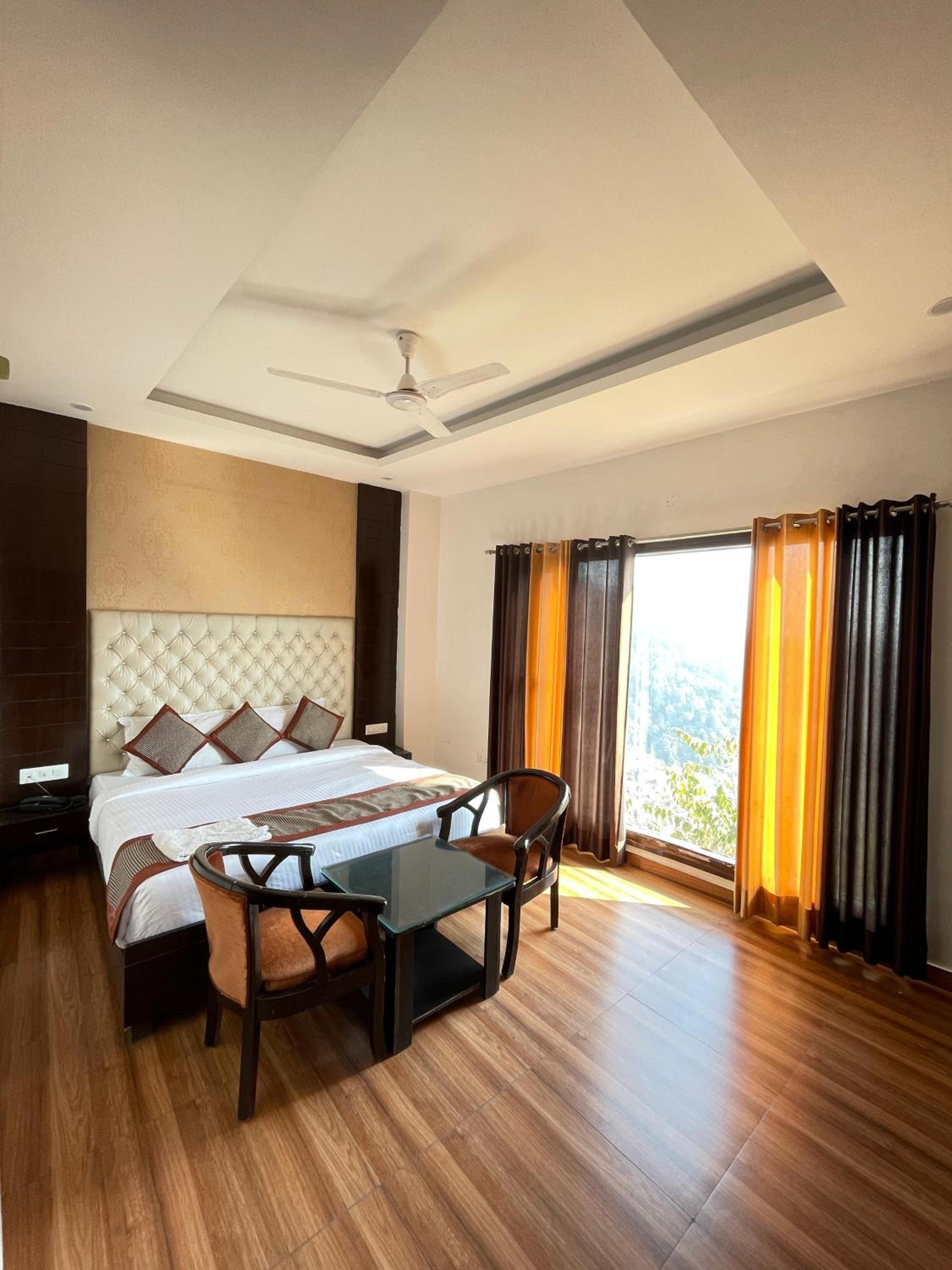 Deluxe Room - Photo 1