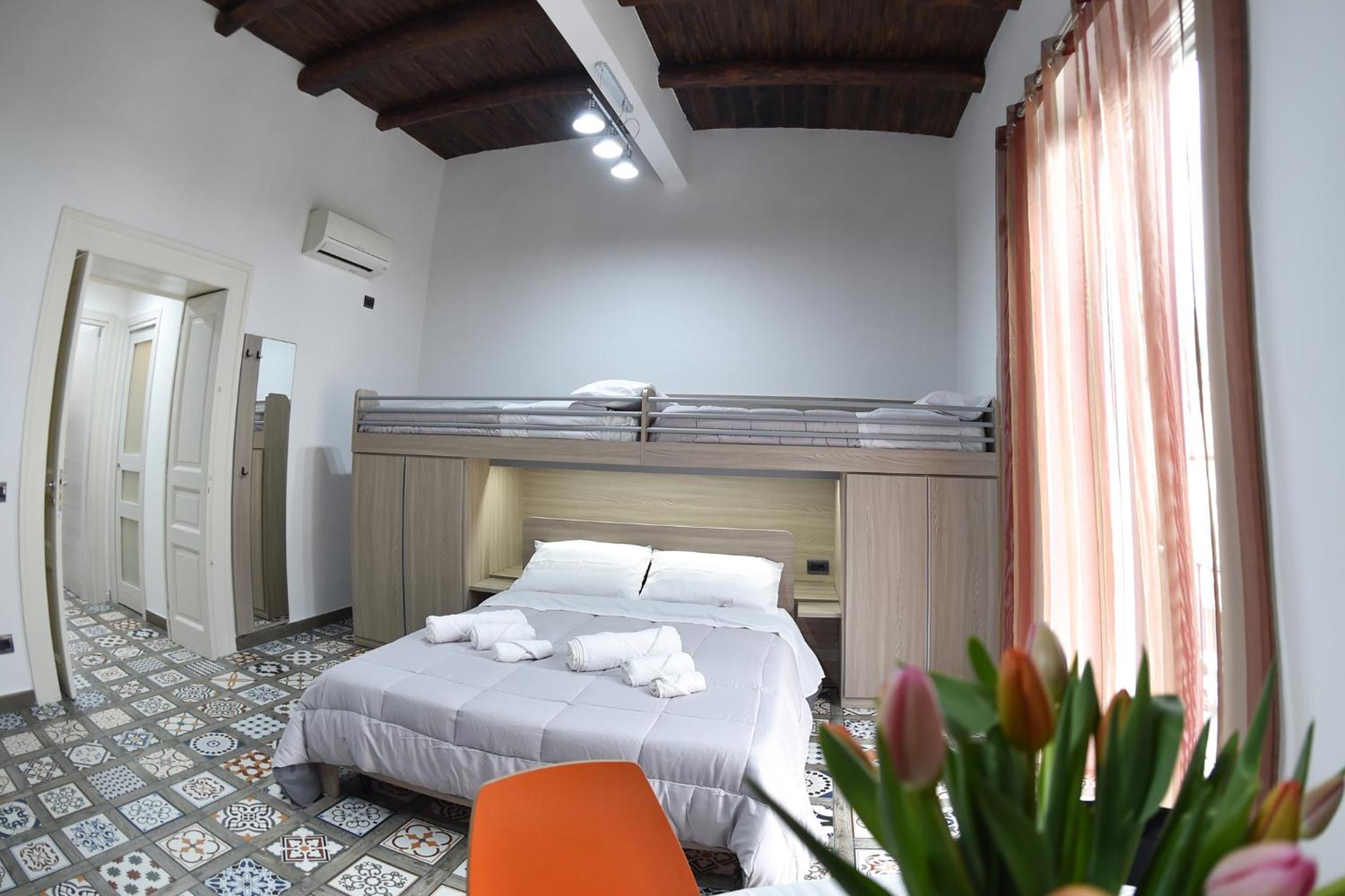 Quadruple Room with Balcony photo 2
