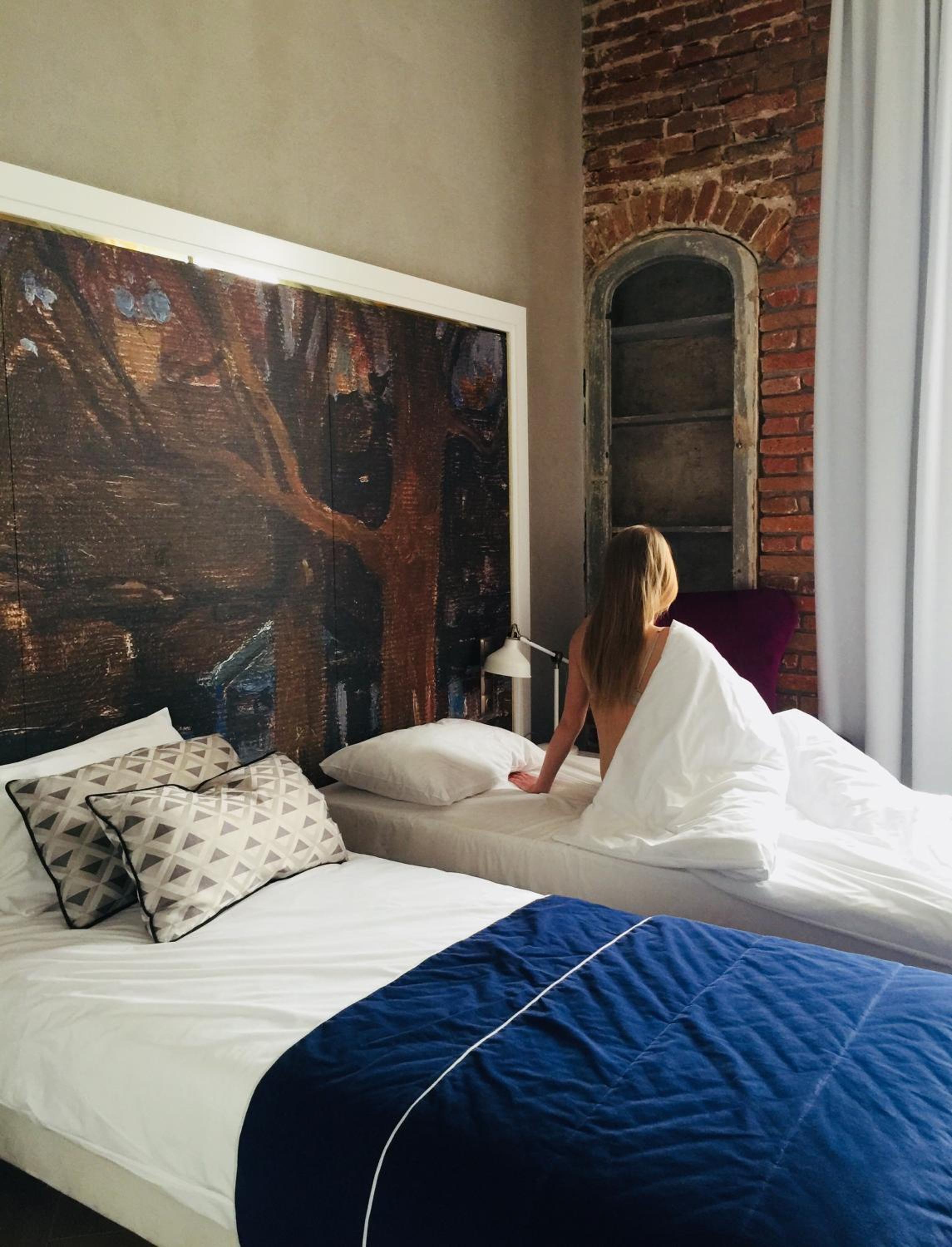 Room with historic brick photo 3