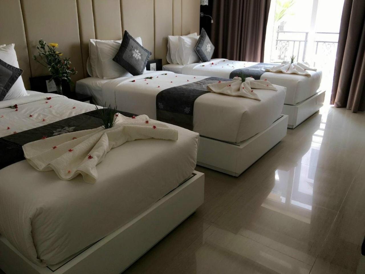 Deluxe Triple Room - Photo 21