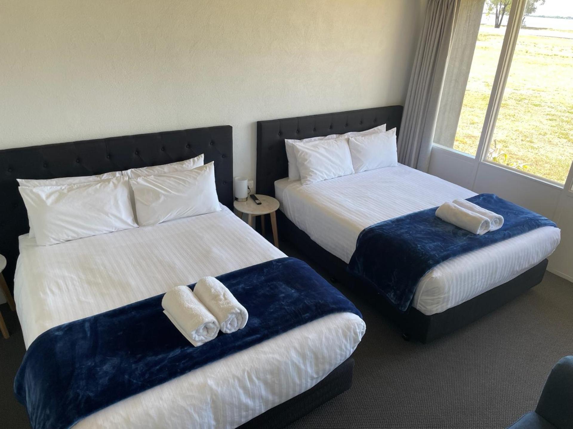 Deluxe Queen Room with Two Queen Beds photo 1