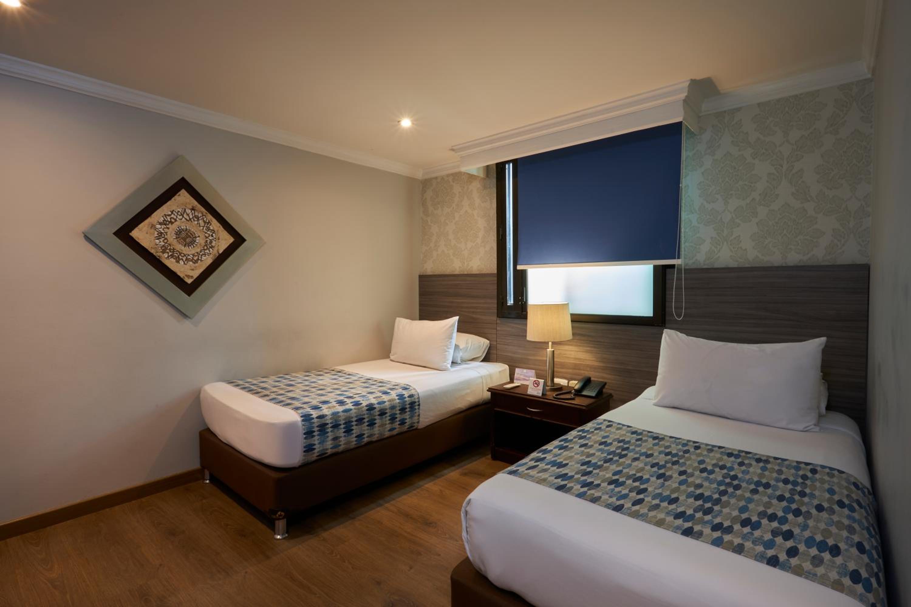Standard Twin Room - Photo 7