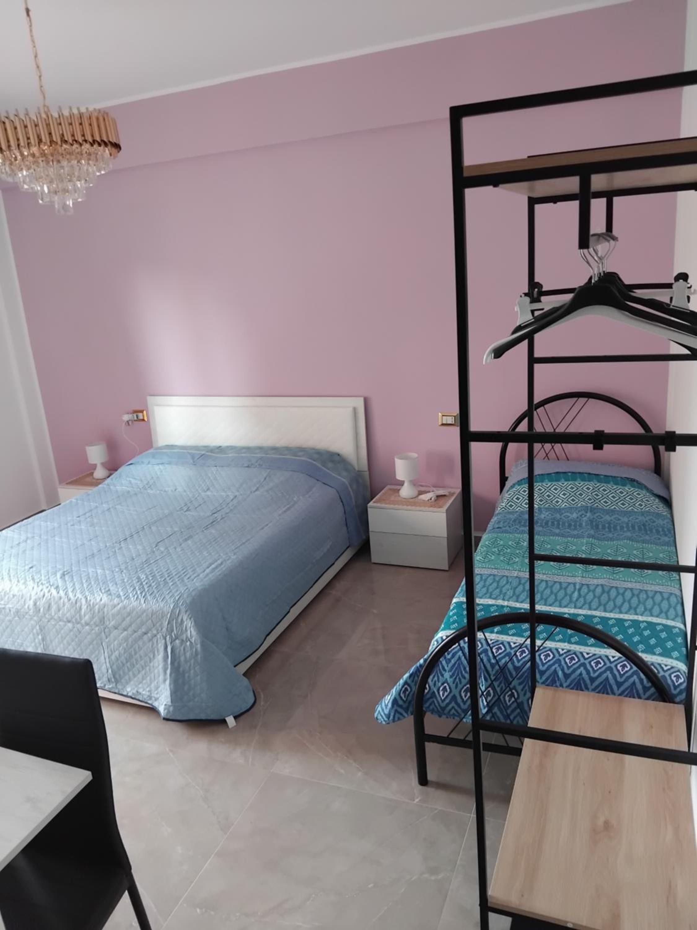 Double Room with Balcony (2 Adults + 1 Child) photo 2
