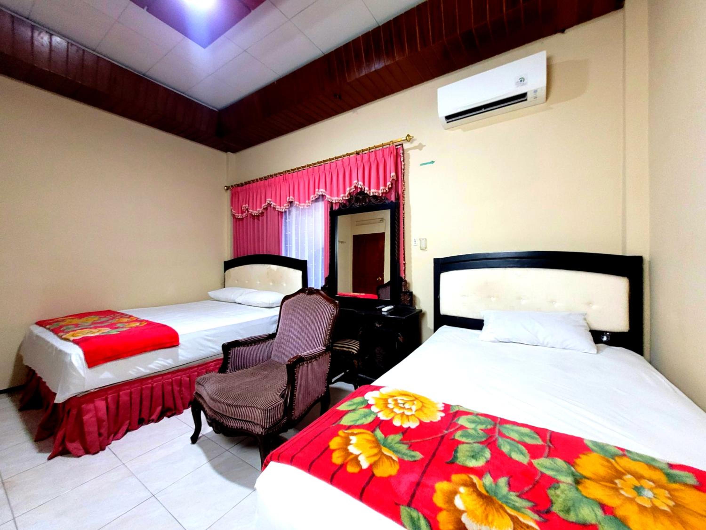 Deluxe Triple Room - Photo 1