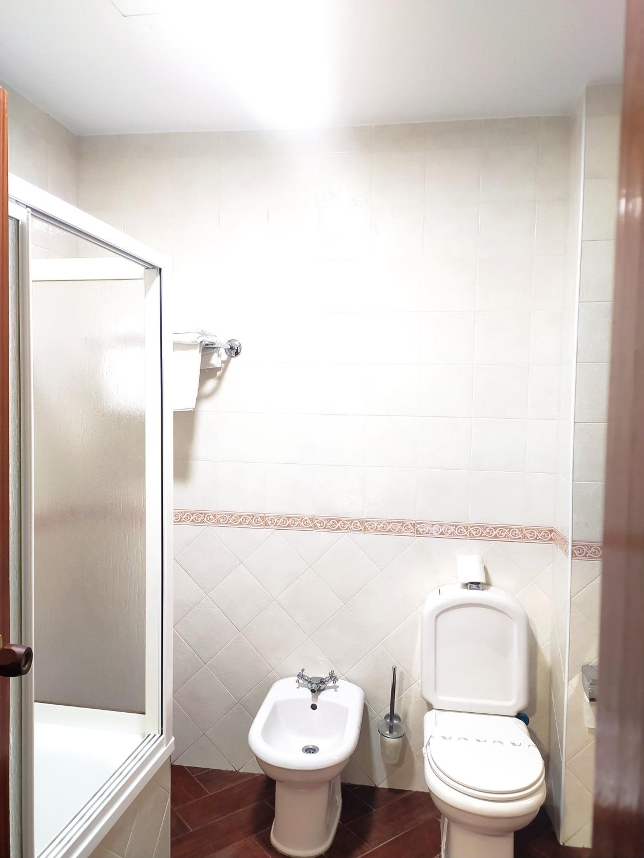 Economy Triple Room photo 2