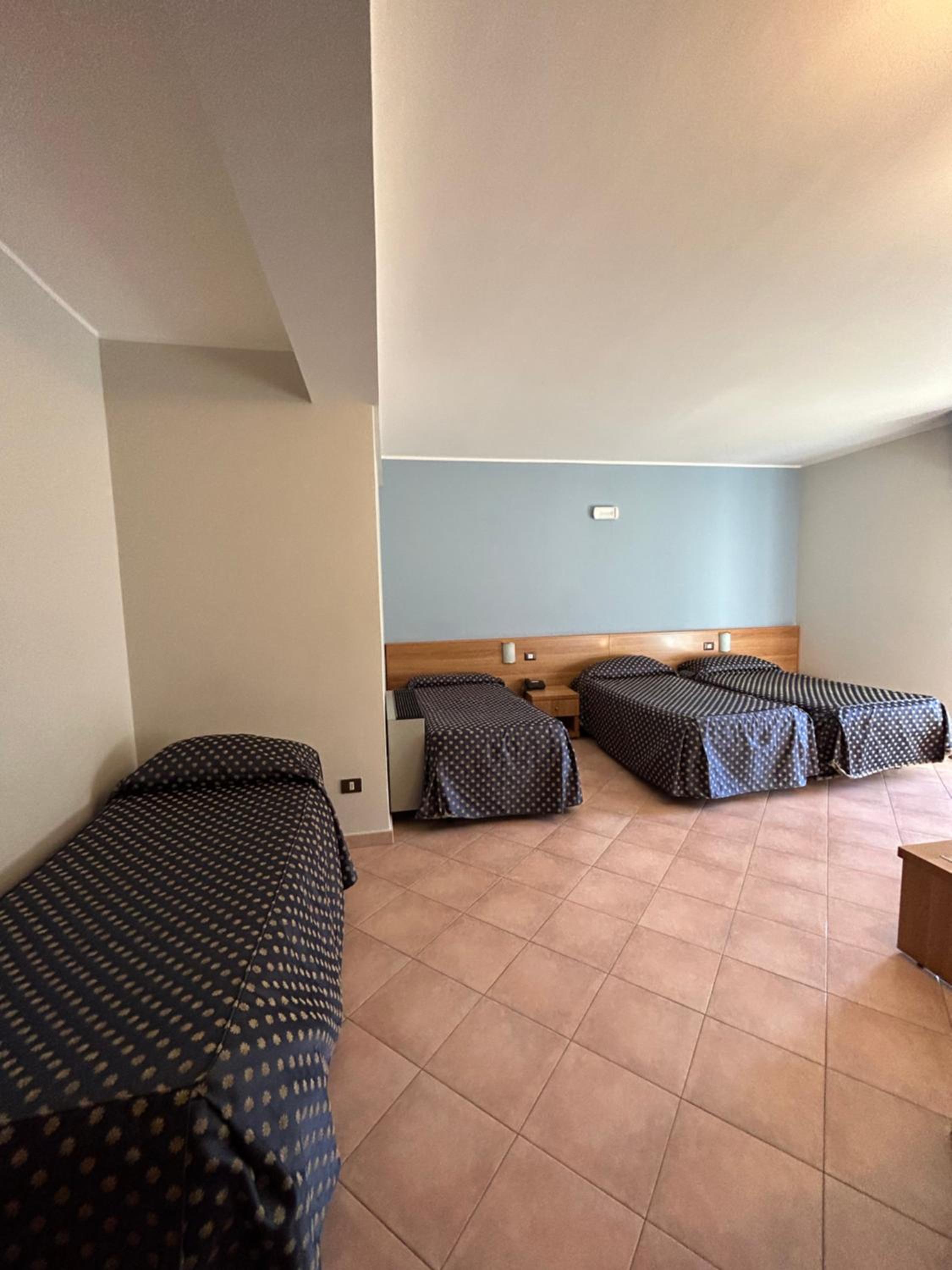 Quadruple Room - Photo 1