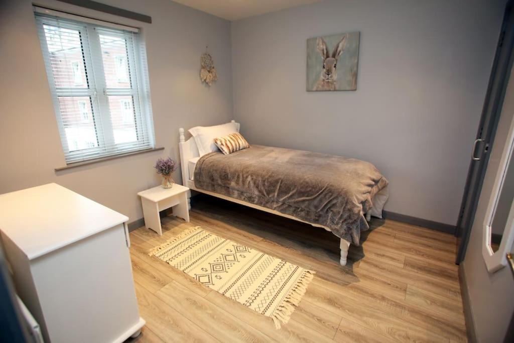 Three-Bedroom Apartment photo 1
