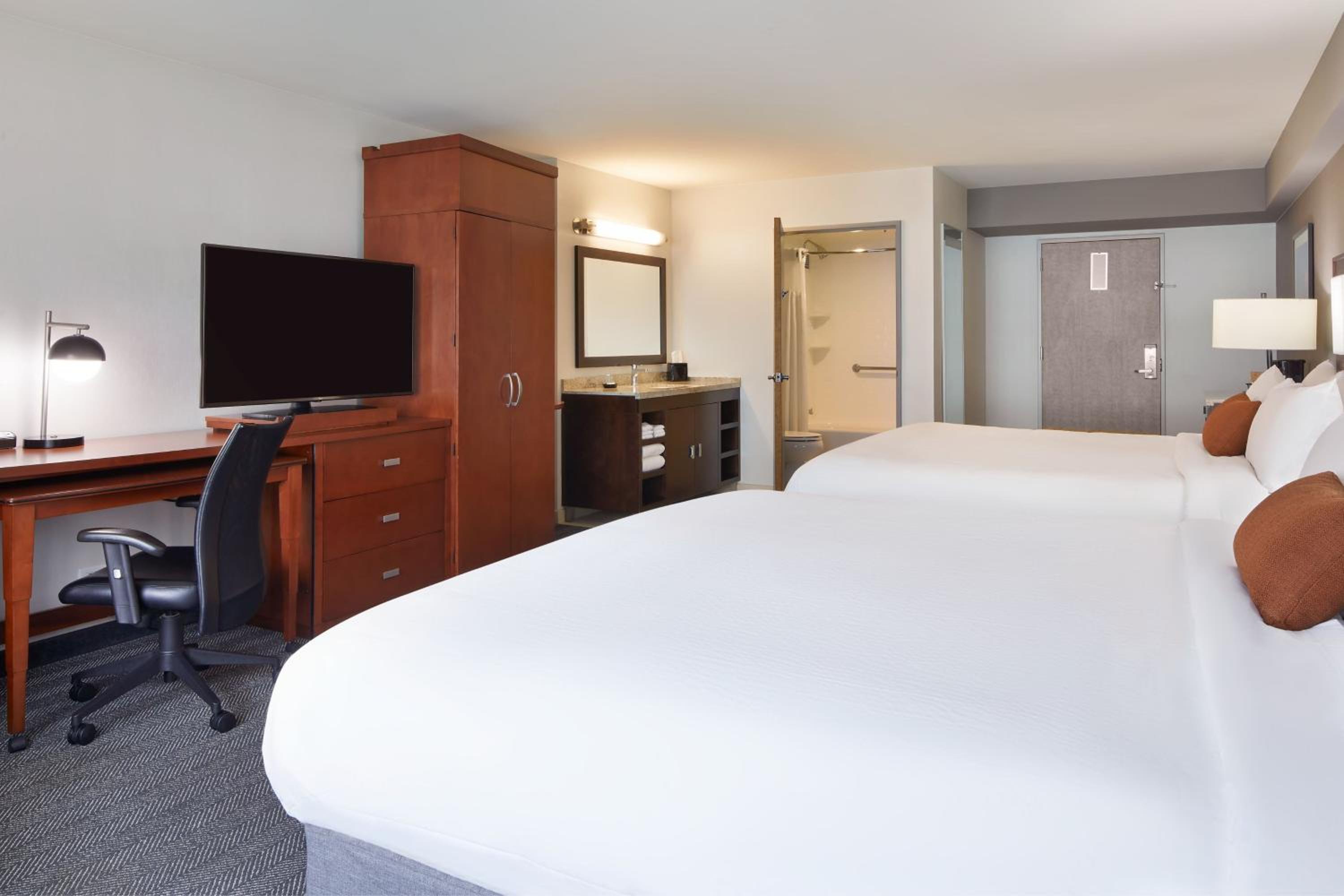 King Room with Two King Beds - Mobility Accessible with Tub photo 1