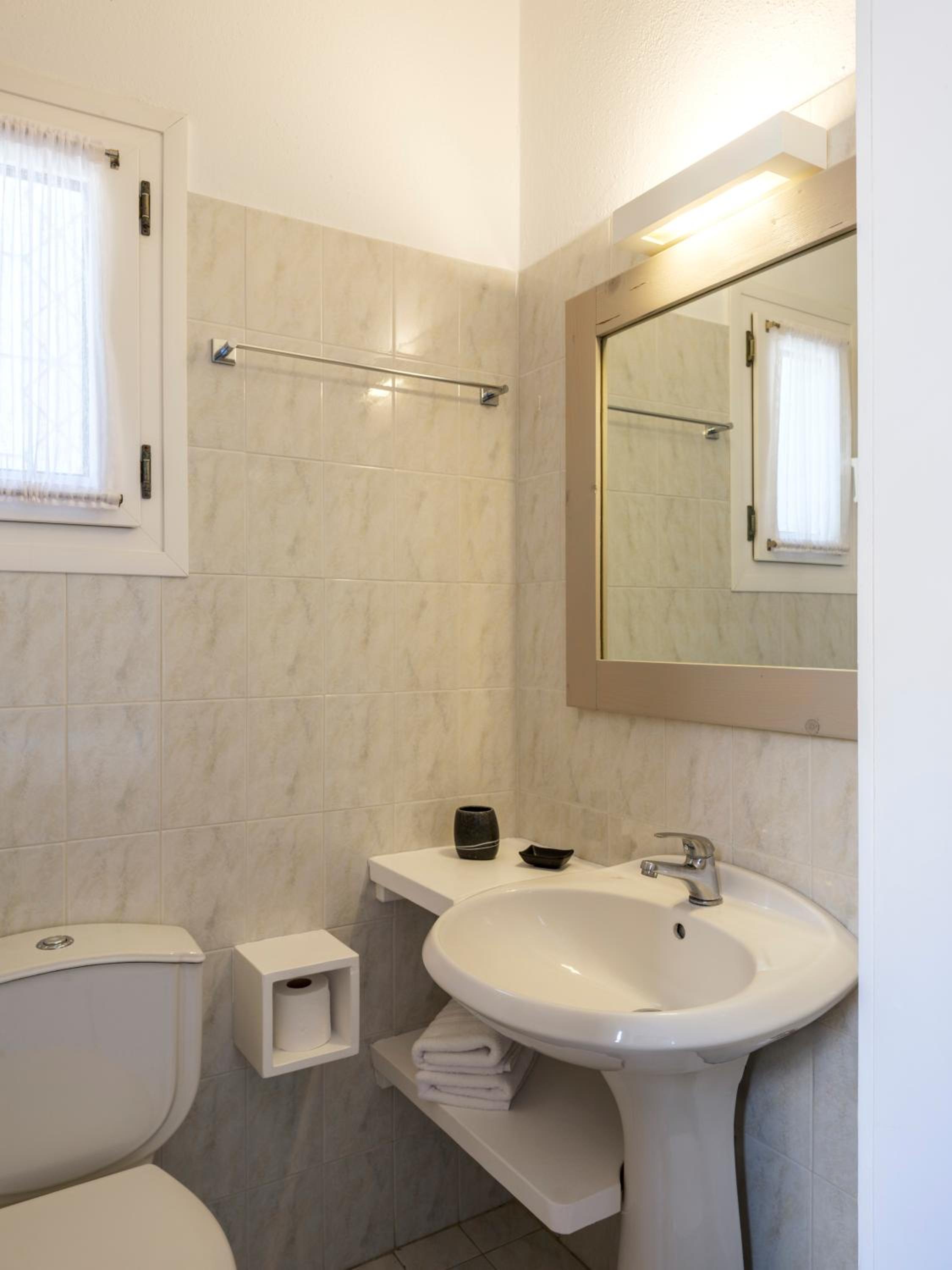 Three-Bedroom Apartment - Photo 19