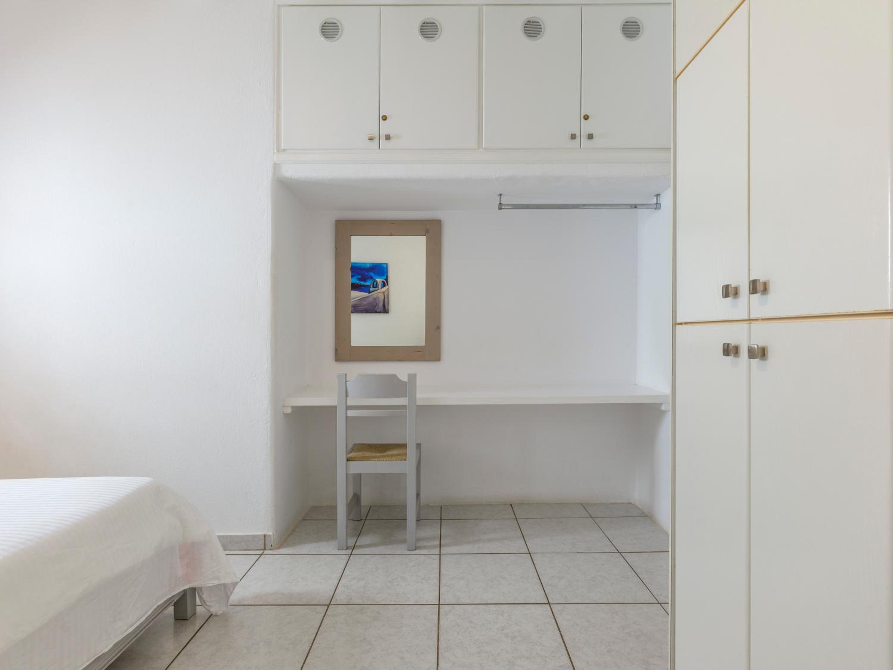 Three-Bedroom Apartment - Photo 12