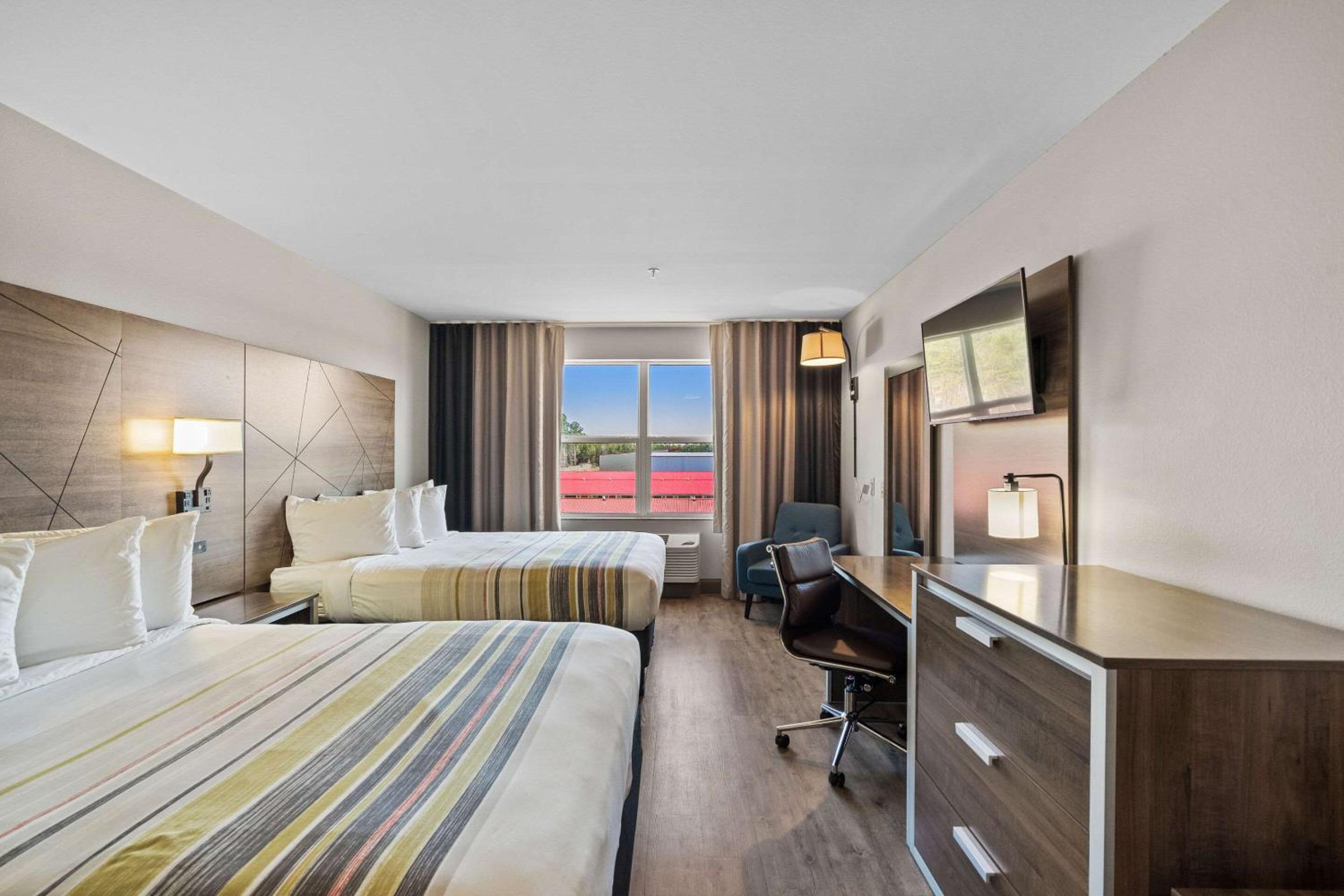 Premium Queen Room with Two Queen Beds - Non-Smoking - Photo 1