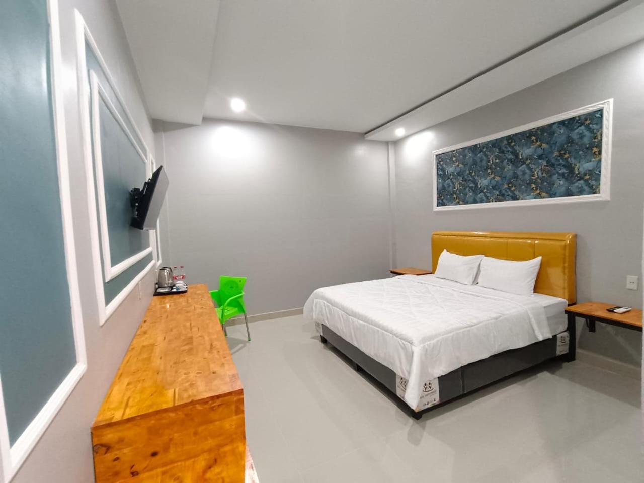 Deluxe King Room - Photo 5