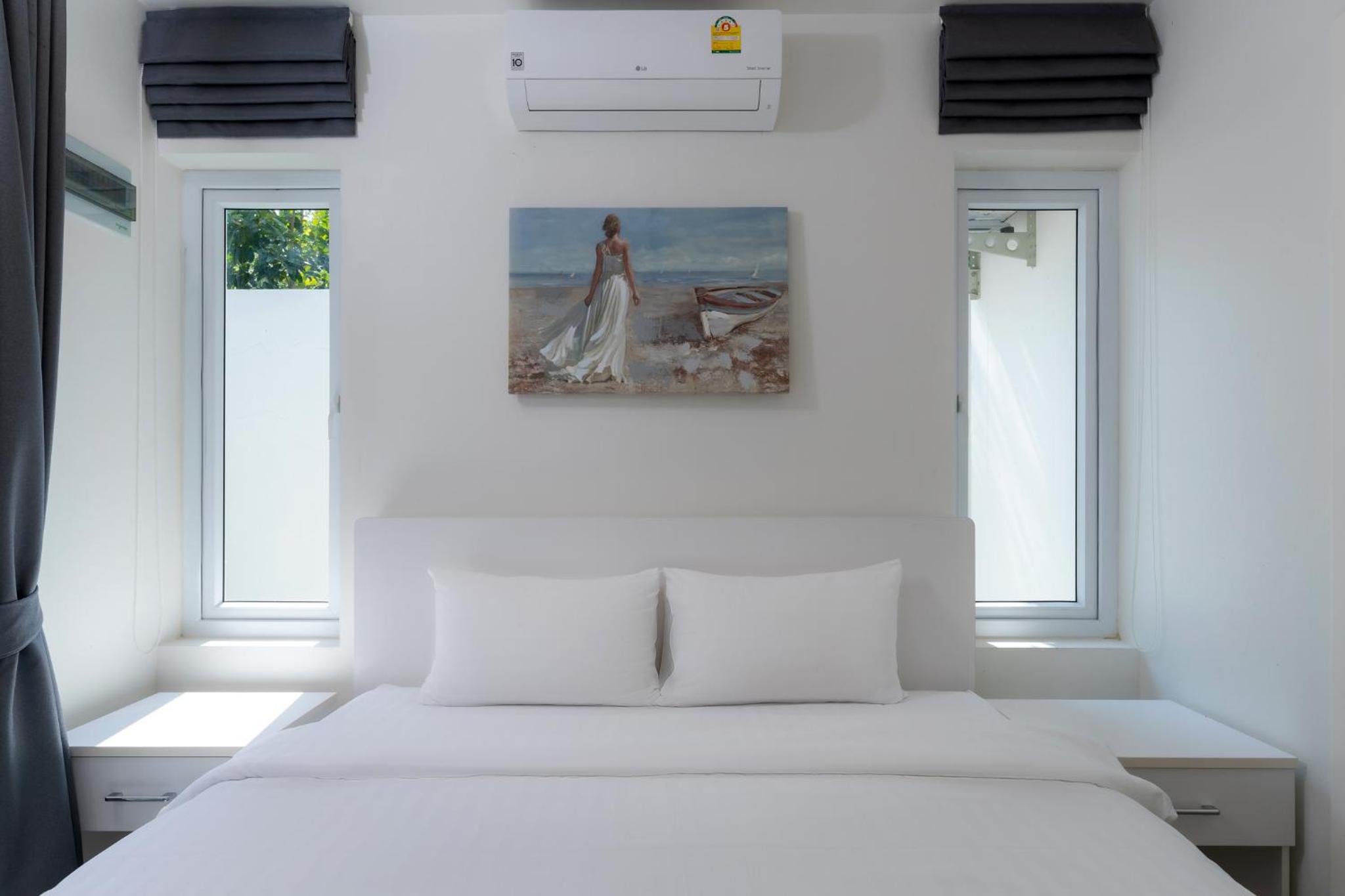 Three-Bedroom Villa - Photo 24