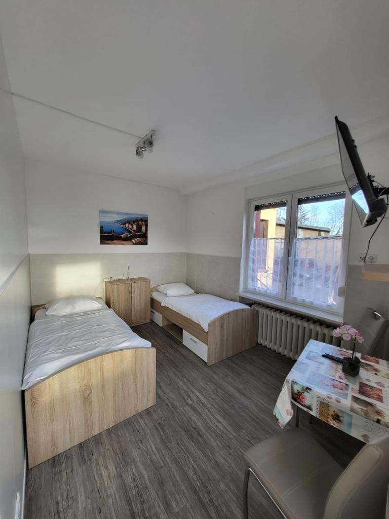 Three-Bedroom Apartment photo 1