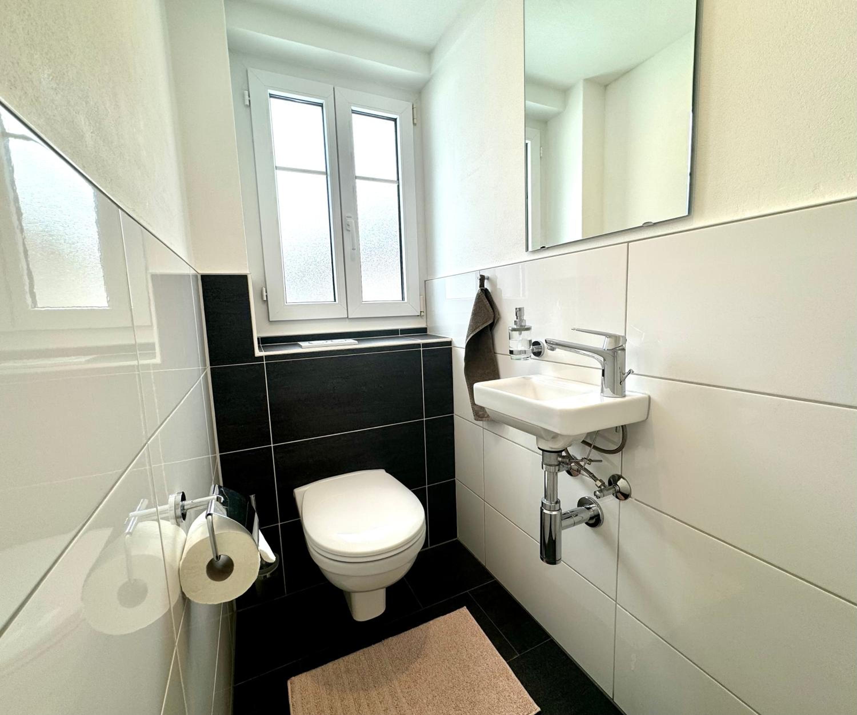 Three-Bedroom Apartment - Photo 8