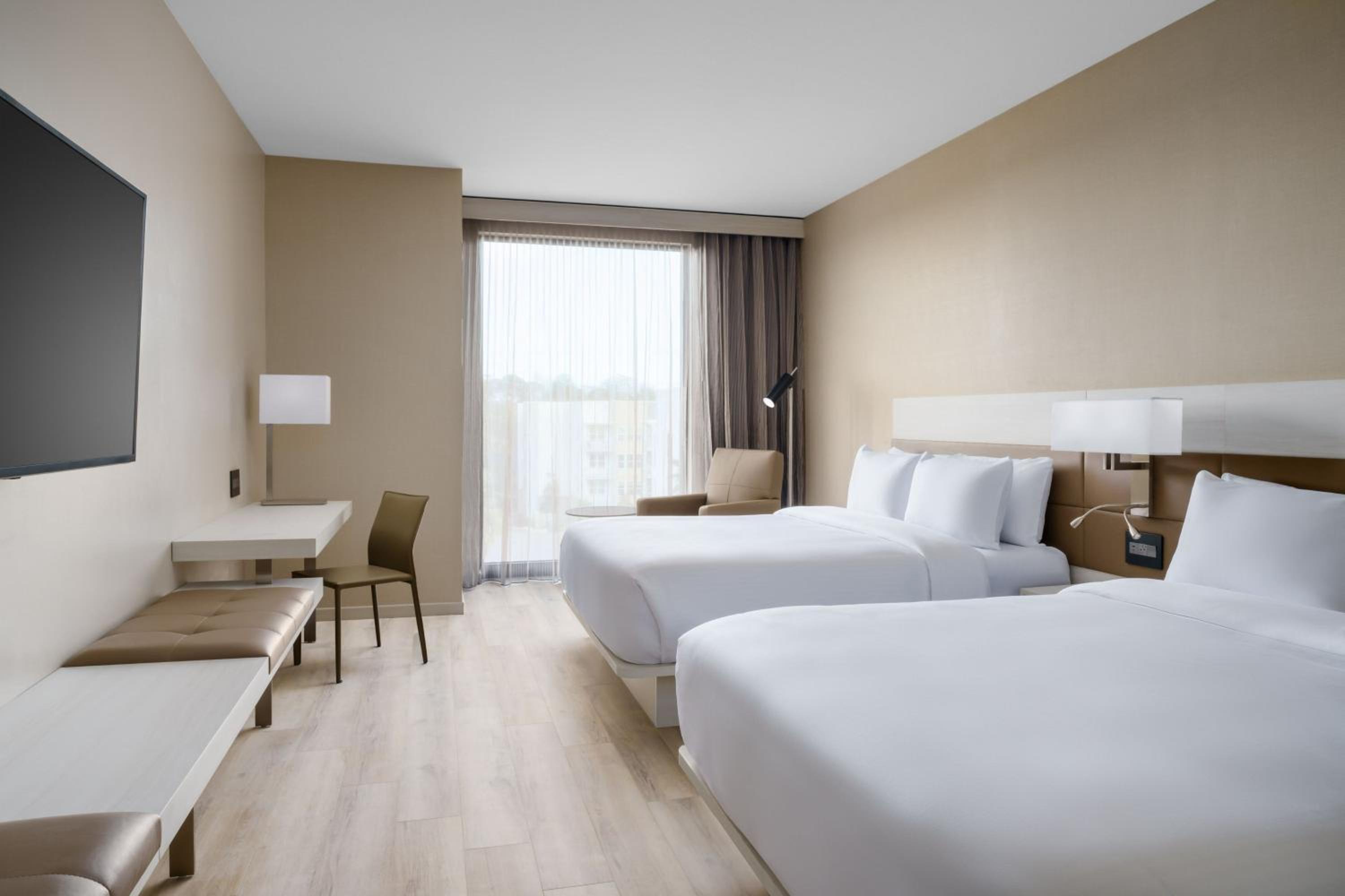 Queen Room with Two Queen Beds - Hearing Accessible - Photo 1