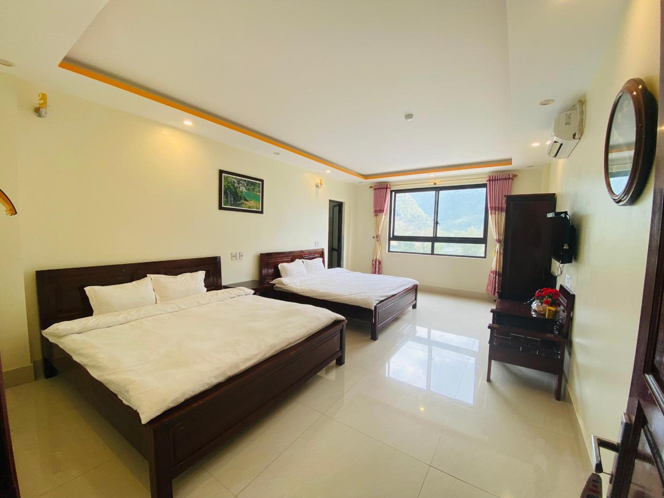 Deluxe Queen Room with Two Queen Beds - Photo 2