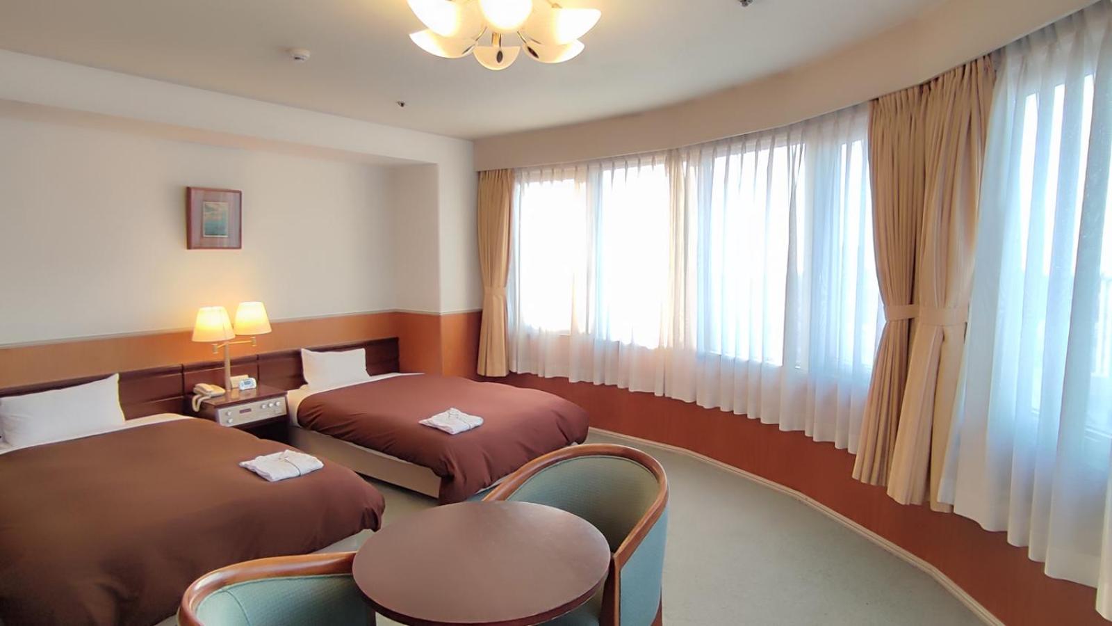 Deluxe Twin Room with Sea View - Smoking photo 1