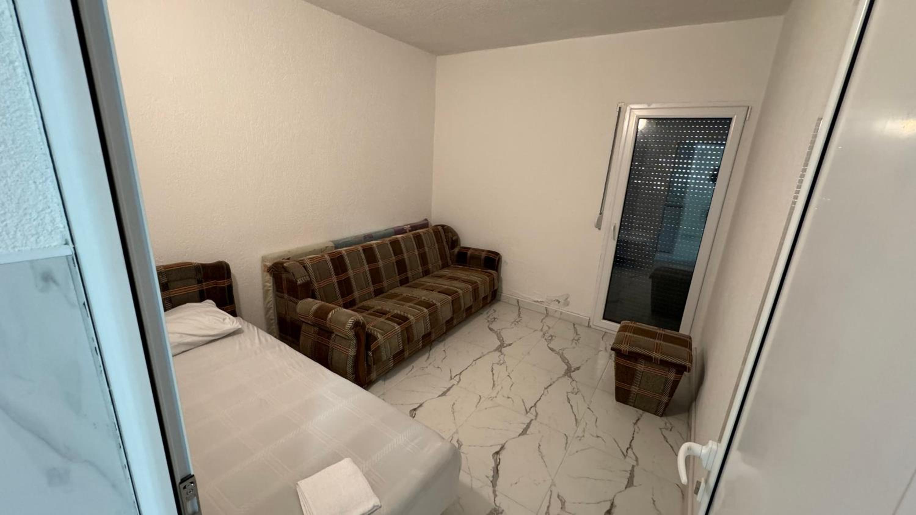 Three-Bedroom Apartment photo 2