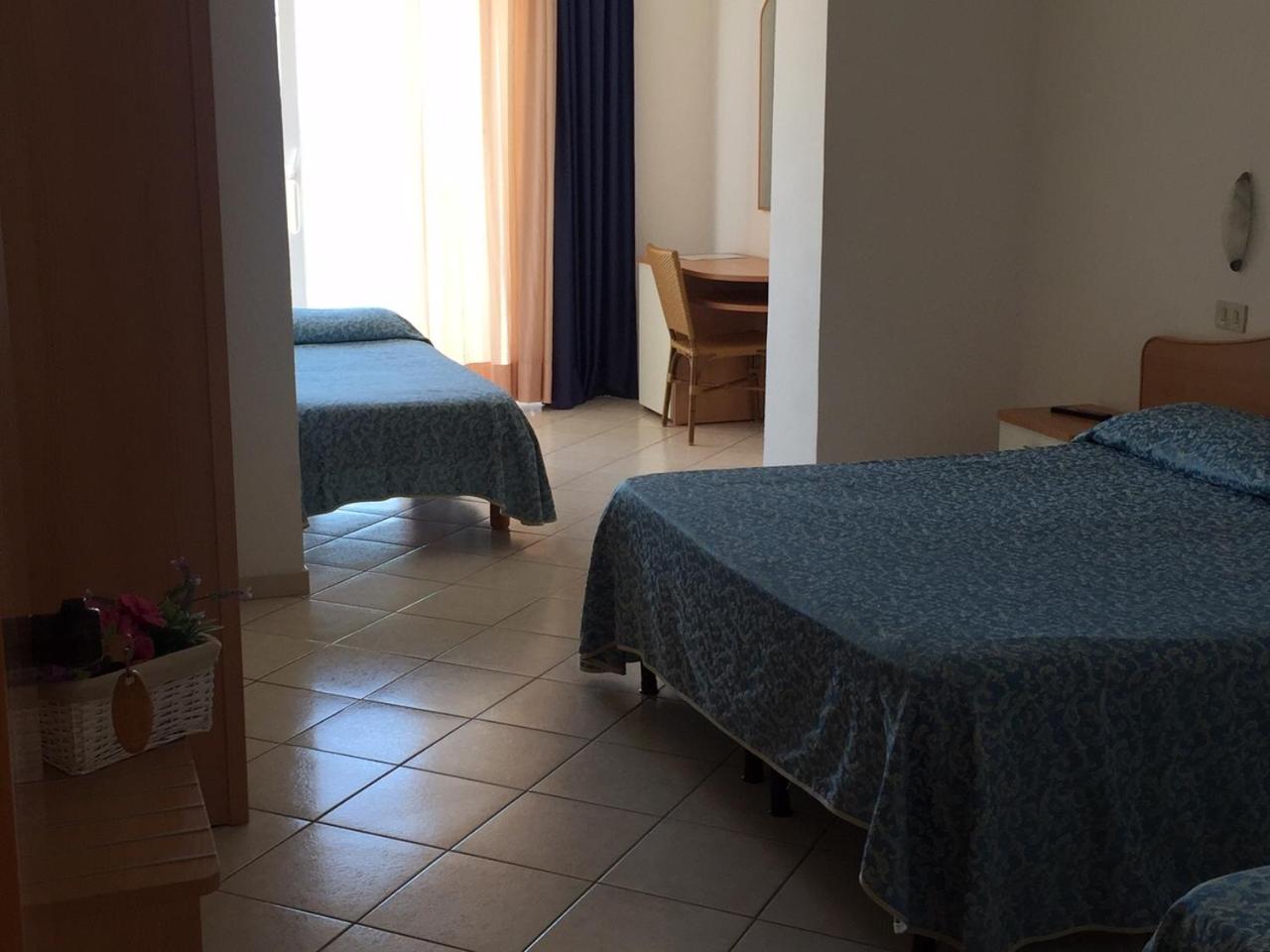 Quadruple Room with Balcony photo 1