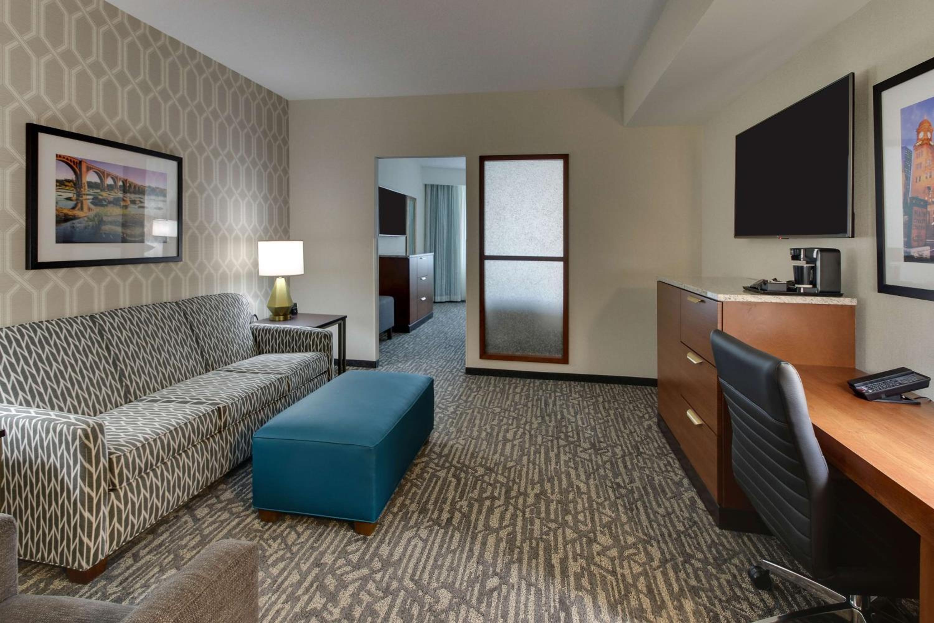 Deluxe Queen Room with Two Queen Beds and Sofa Bed - Hearing Accessible, Tub photo 1