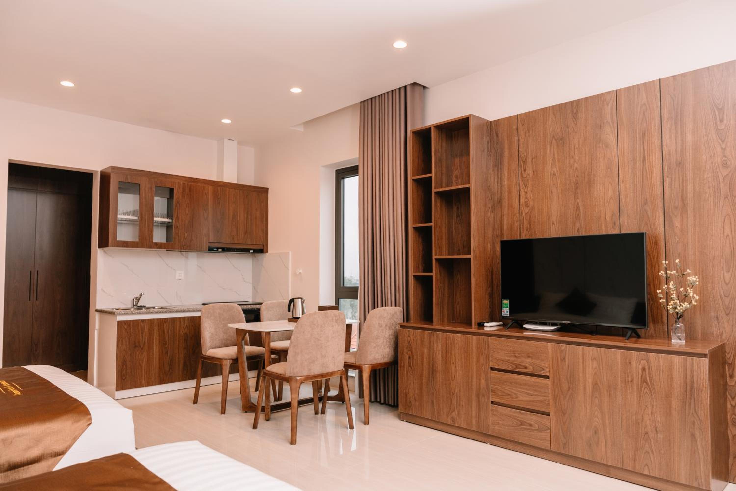 Deluxe Quadruple Room - Photo 4