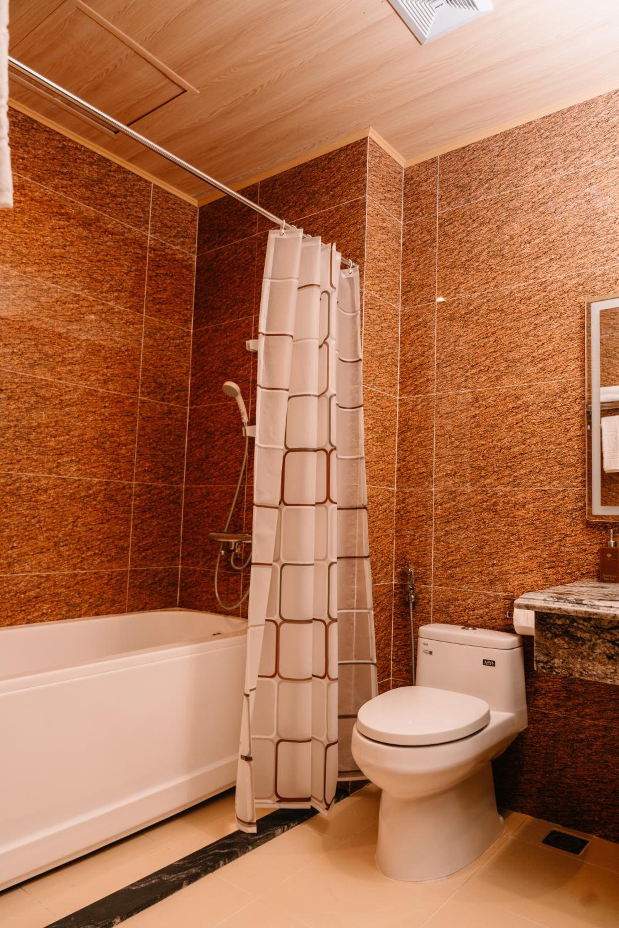Deluxe Quadruple Room - Photo 5