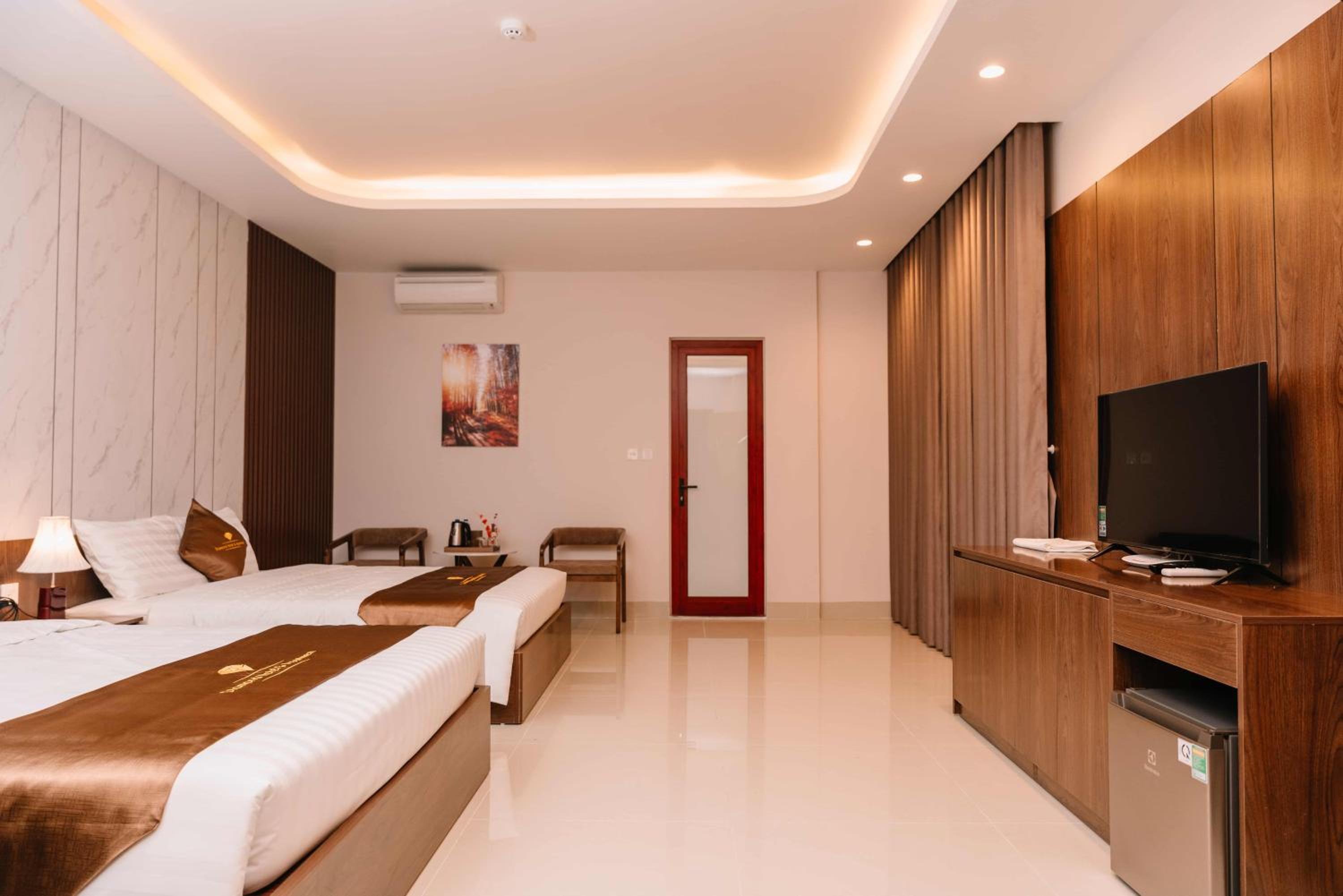 Deluxe Quadruple Room - Photo 7