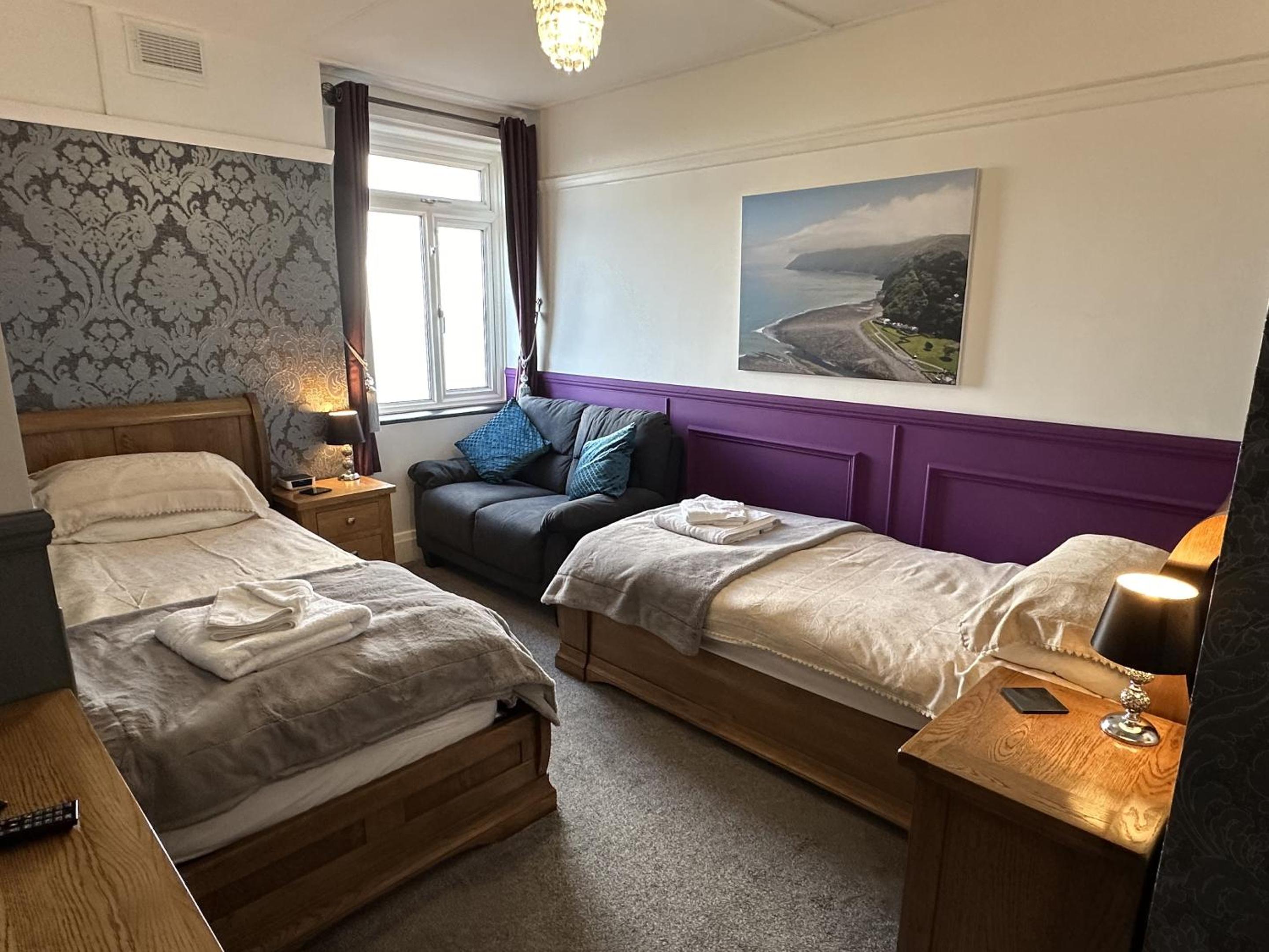 Deluxe Quadruple Room - Photo 13