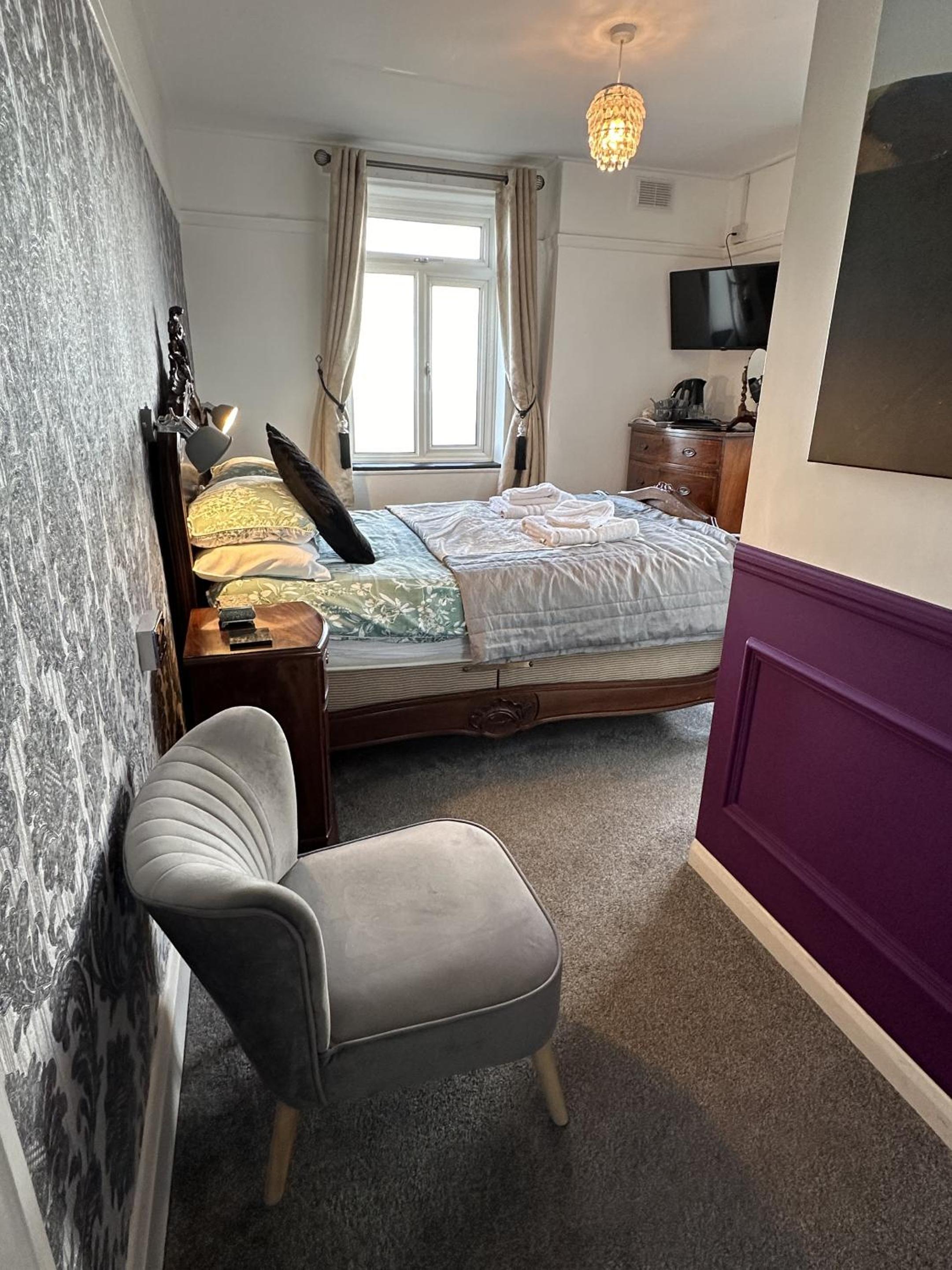 Deluxe Quadruple Room - Photo 1