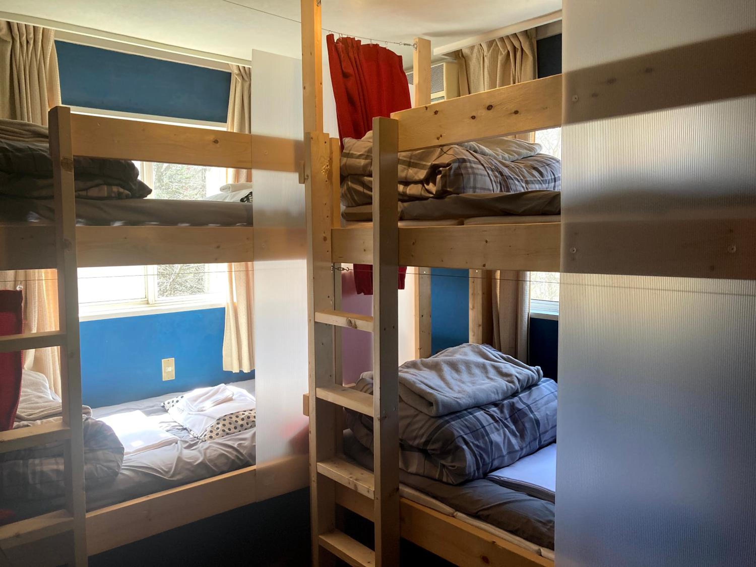 Upper Bunk Bed in Female Dormitory Room photo 1