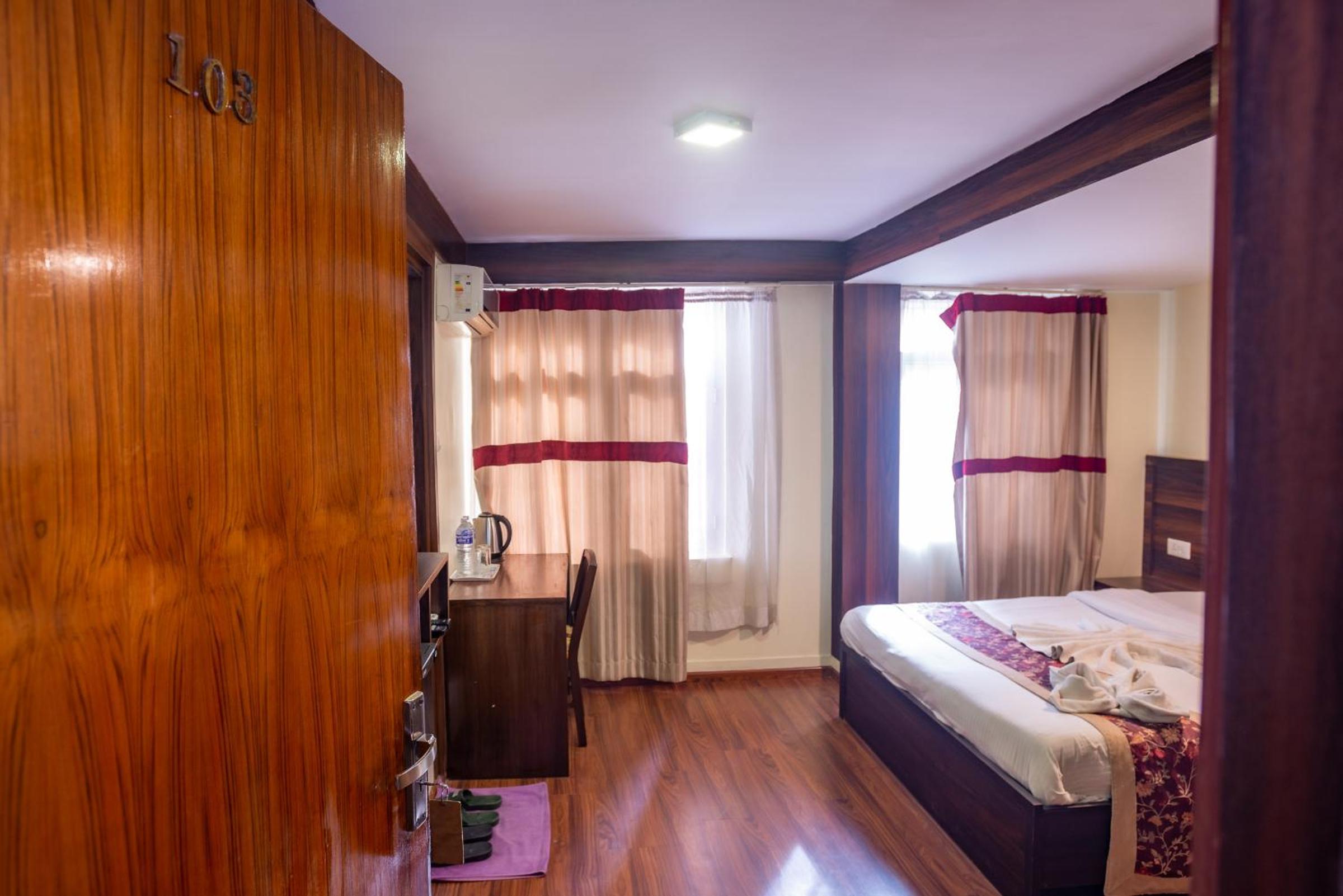 Deluxe Family Room with Complimentary Airport Pickup for International Arrival photo 1